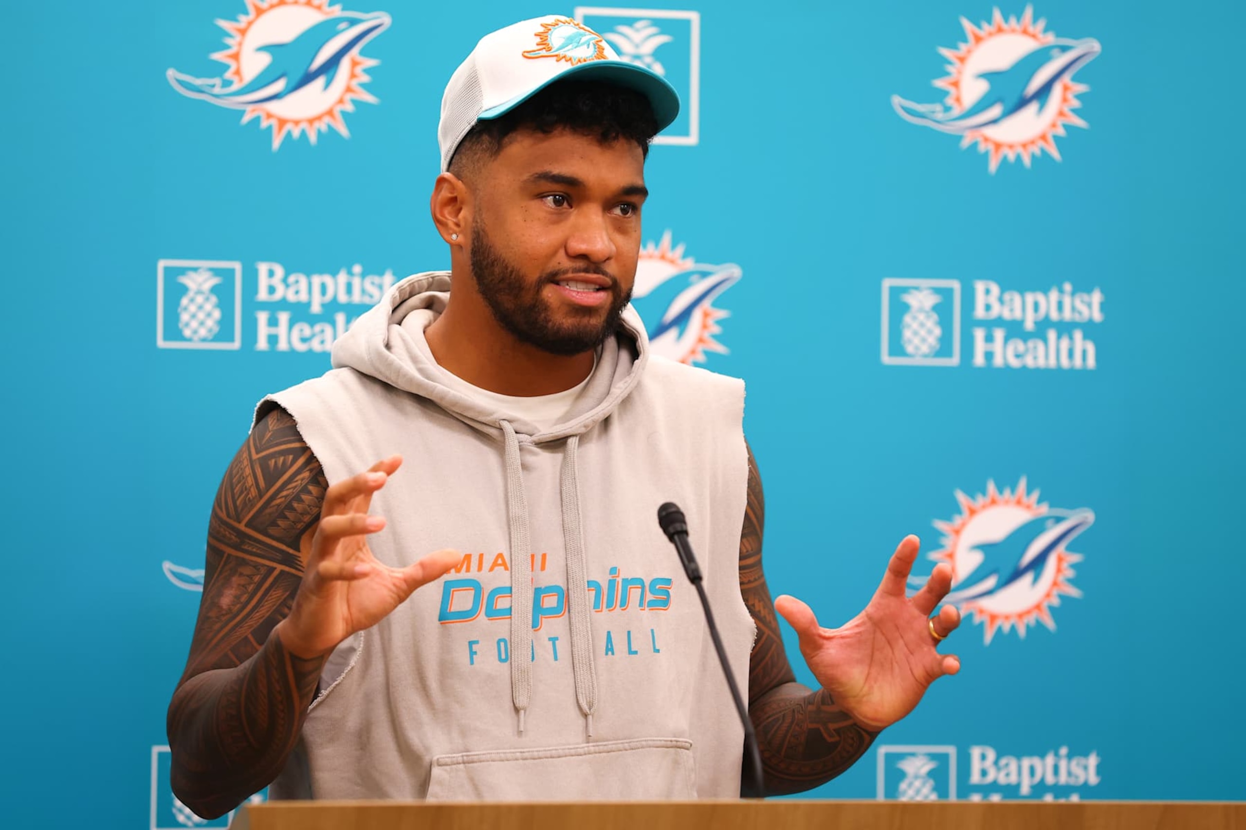 MIAMI GARDENS, FLORIDA - OCTOBER 21: Quarterback Tua Tagovailoa of the Miami Dolphins addresses the media at Baptist Health Training Complex on October 21, 2024 in Miami Gardens, Florida. (Photo by Megan Briggs/Getty Images) MIAMI GARDENS, FLORIDA - OCTOBER 21: Quarterback Tua Tagovailoa of the Miami Dolphins addresses the media at Baptist Health Training Complex on October 21, 2024 in Miami Gardens, Florida. (Photo by Megan Briggs/Getty Images)
