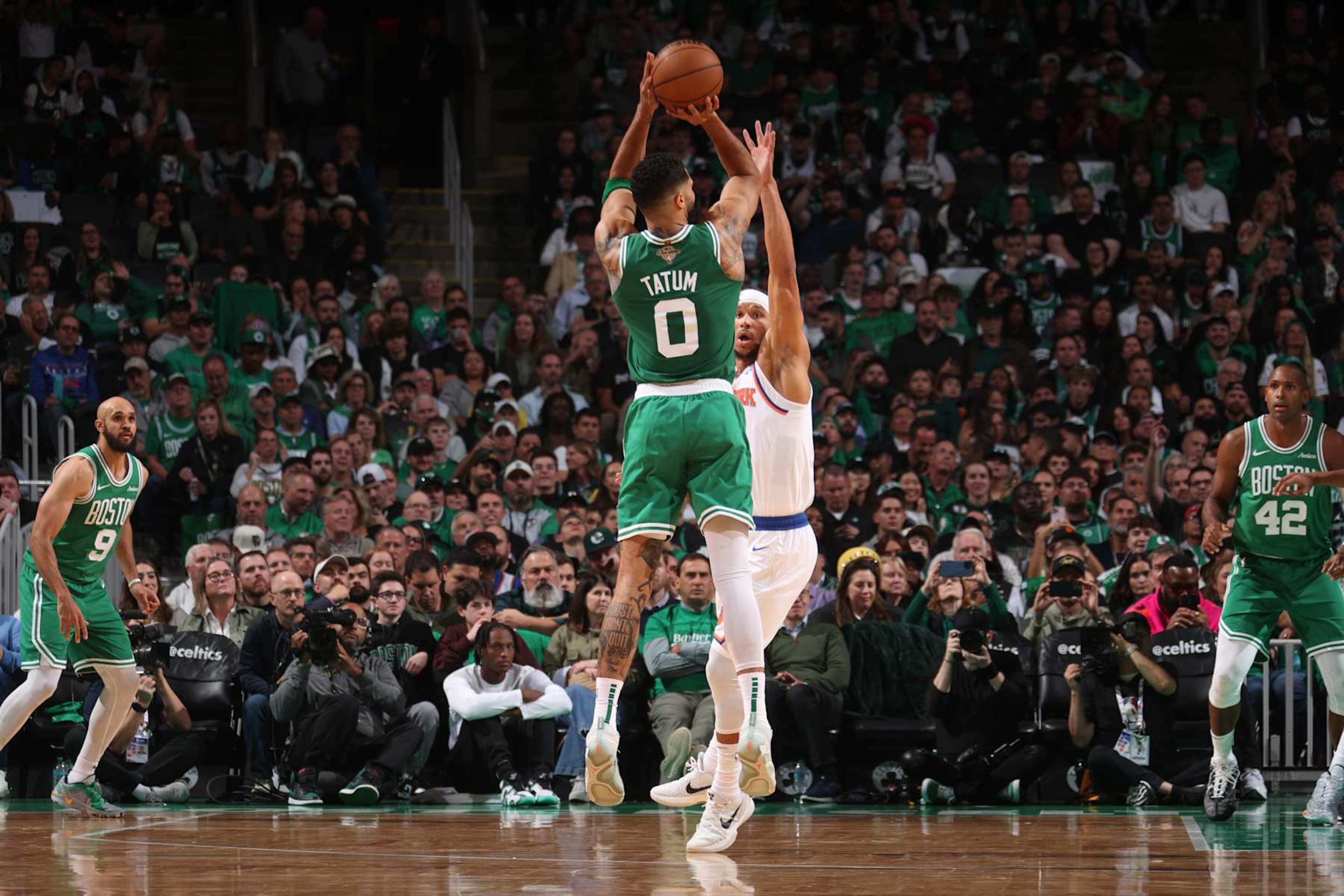 BOSTON, MA - OCTOBER 22: Jayson Tatum #0 of the Boston Celtics shoots a three point basket during the game against the New York Knicks on October 22, 2024 at TD Garden in Boston, Massachusetts. NOTE TO USER: User expressly acknowledges and agrees that, by downloading and or using this Photograph, user is consenting to the terms and conditions of the Getty Images License Agreement. Mandatory Copyright Notice: Copyright 2024 NBAE (Photo by Nathaniel S. Butler/NBAE via Getty Images) BOSTON, MA - OCTOBER 22: Jayson Tatum #0 of the Boston Celtics shoots a three point basket during the game against the New York Knicks on October 22, 2024 at TD Garden in Boston, Massachusetts. NOTE TO USER: User expressly acknowledges and agrees that, by downloading and or using this Photograph, user is consenting to the terms and conditions of the Getty Images License Agreement. Mandatory Copyright Notice: Copyright 2024 NBAE (Photo by Nathaniel S. Butler/NBAE via Getty Images)
