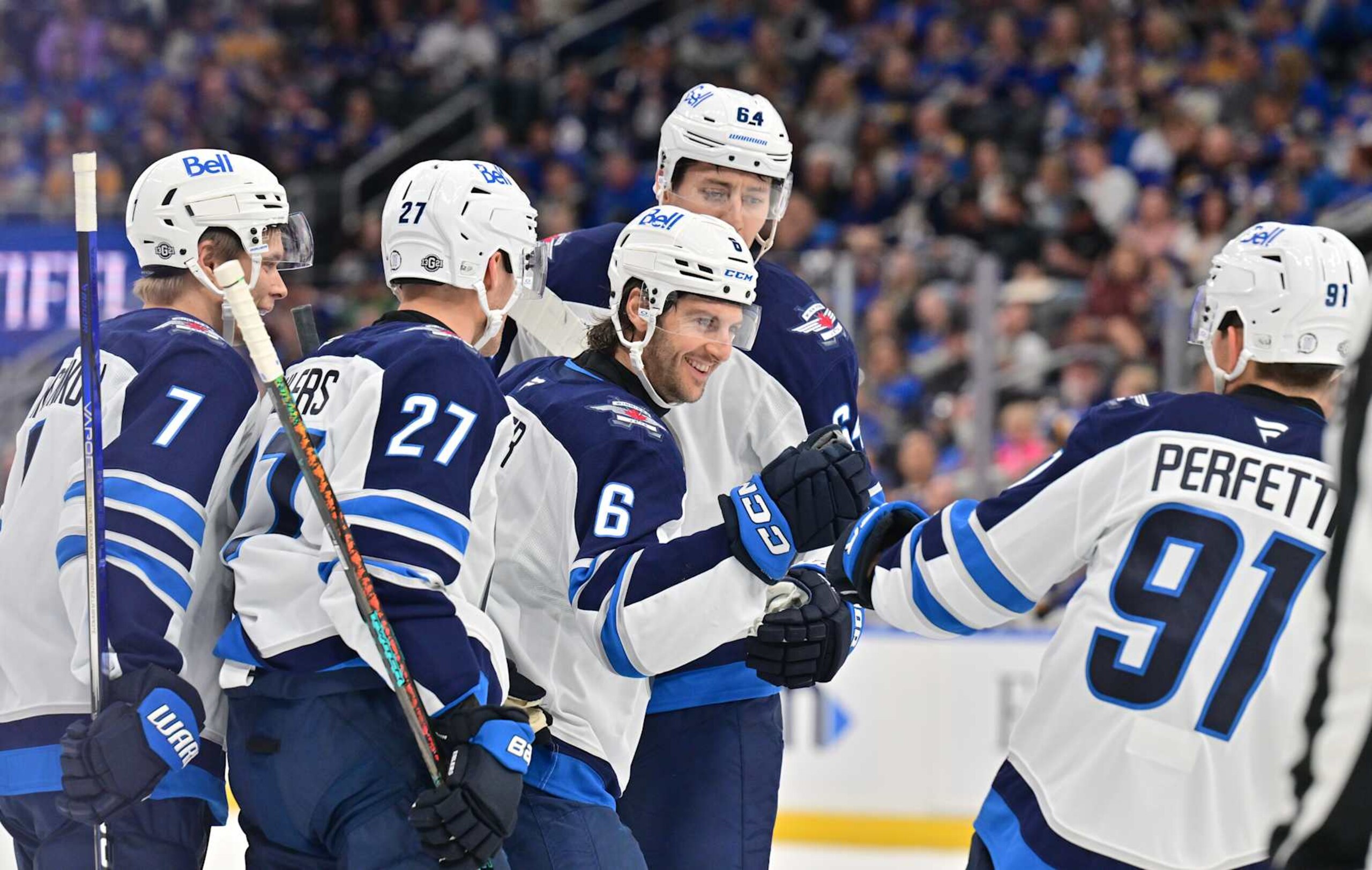 ST. LOUIS, MO - OCTOBER 22: Winnipeg payers celebrate after scoring during a NHL game between the Winnipeg Jets and the St. Louis Blues, on October 22, 2024, at Enterprise Center, St. Louis, MO. (Photo by Keith Gillett/Icon Sportswire via Getty Images) ST. LOUIS, MO - OCTOBER 22: Winnipeg payers celebrate after scoring during a NHL game between the Winnipeg Jets and the St. Louis Blues, on October 22, 2024, at Enterprise Center, St. Louis, MO. (Photo by Keith Gillett/Icon Sportswire via Getty Images)