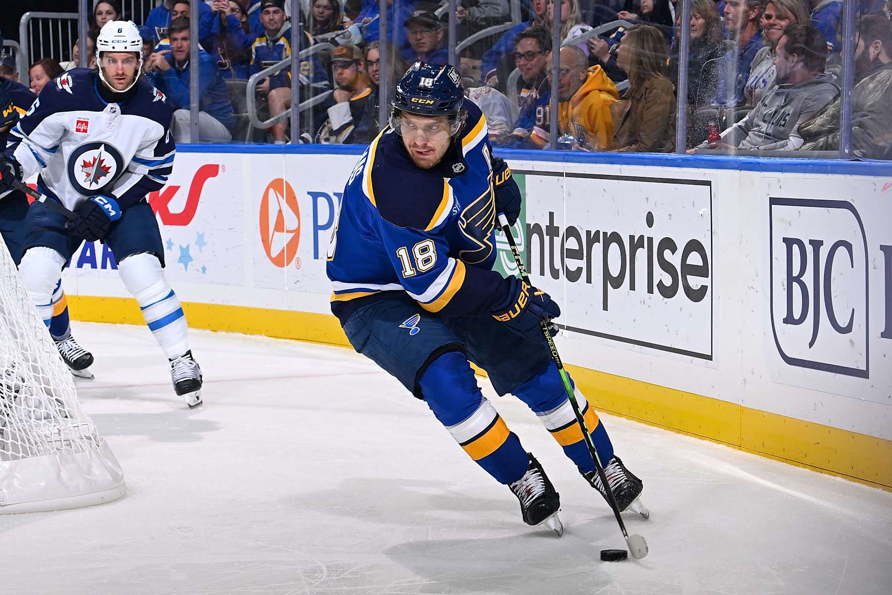 ST. LOUIS, MO - OCTOBER 22: Robert Thomas #18 of the St. Louis Blues controls the puck against the Winnipeg Jets on October 22, 2024 at the Enterprise Center in St. Louis, Missouri. (Photo by Scott Rovak/NHLI via Getty Images)
