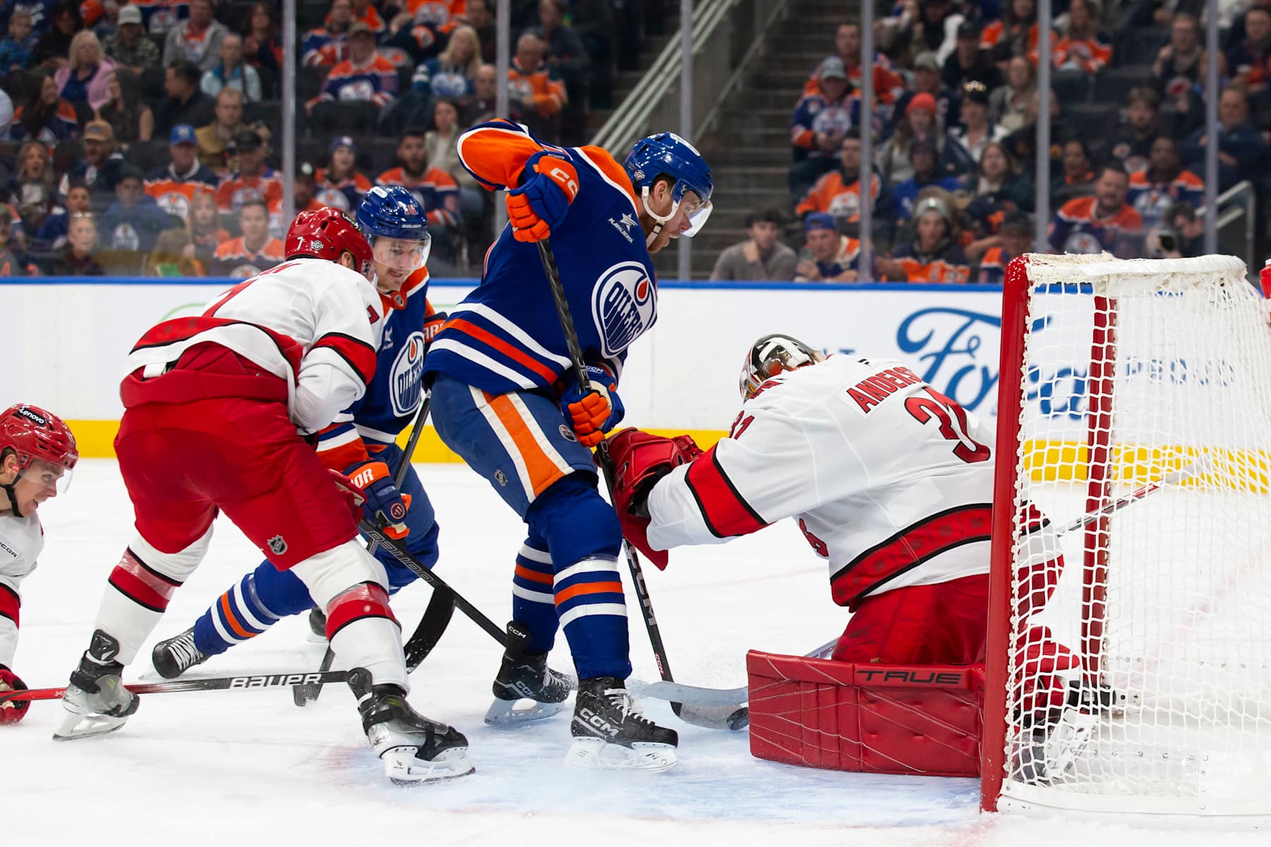 EDMONTON, CANADA - OCTOBER 22: Connor McDavid #97 of the Edmonton Oilers scores against goaltender Frederik Andersen #31 of the Carolina Hurricanes during the second period at Rogers Place on October 22, 2024 in Edmonton, Canada. (Photo by Codie McLachlan/Getty Images)
