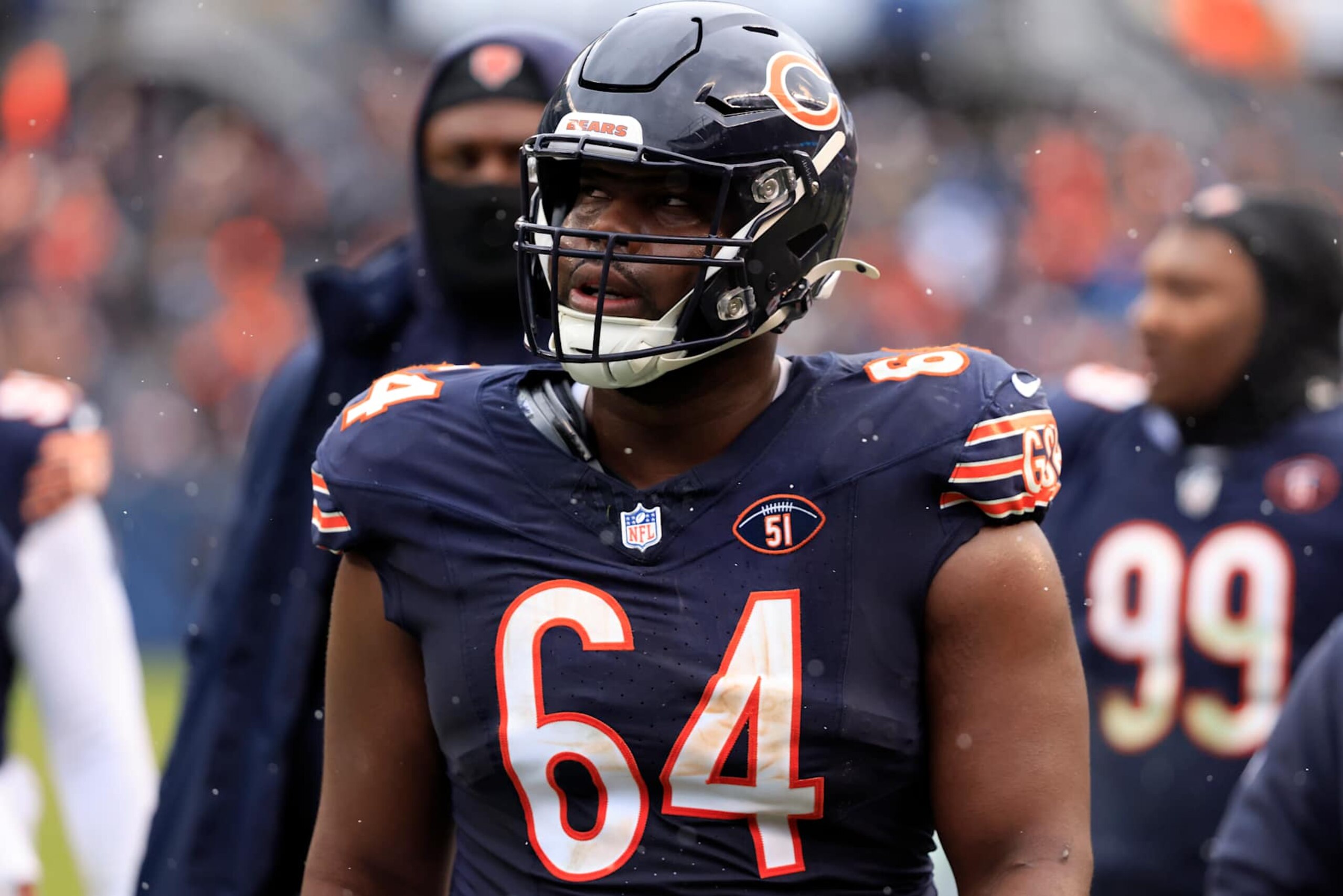 CHICAGO, ILLINOIS - DECEMBER 31: Nate Davis #64 of the Chicago Bears walks off the field at half time in the game against the Atlanta Falcons at Soldier Field on December 31, 2023 in Chicago, Illinois. (Photo by Justin Casterline/Getty Images)