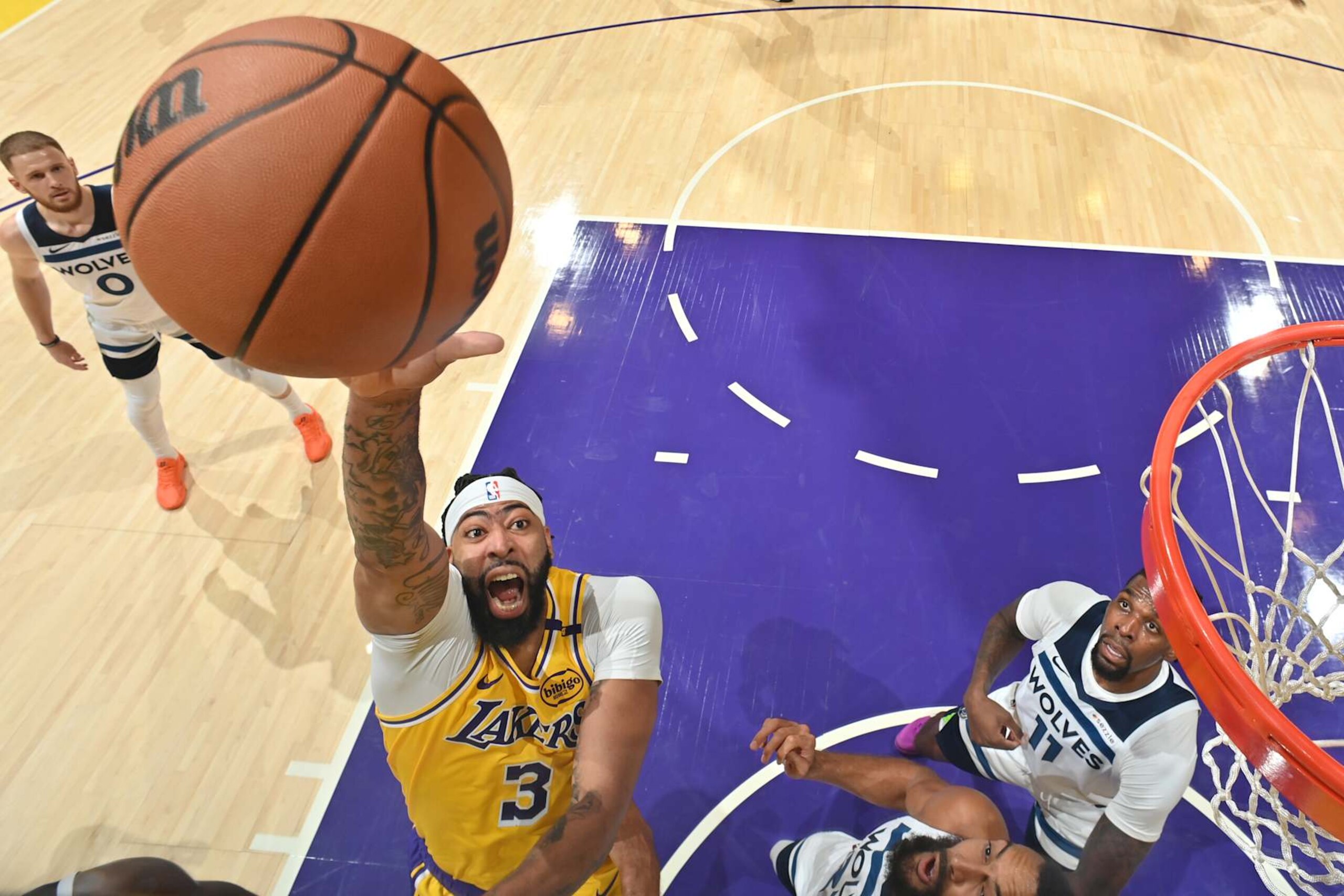 LOS ANGELES, CA - OCTOBER 22: Anthony Davis #3 of the Los Angeles Lakers drives to the basket during the game against the Minnesota Timberwolves on October 22, 2024 at Crypto.Com Arena in Los Angeles, California. NOTE TO USER: User expressly acknowledges and agrees that, by downloading and/or using this Photograph, user is consenting to the terms and conditions of the Getty Images License Agreement. Mandatory Copyright Notice: Copyright 2024 NBAE (Photo by Adam Pantozzi/NBAE via Getty Images)