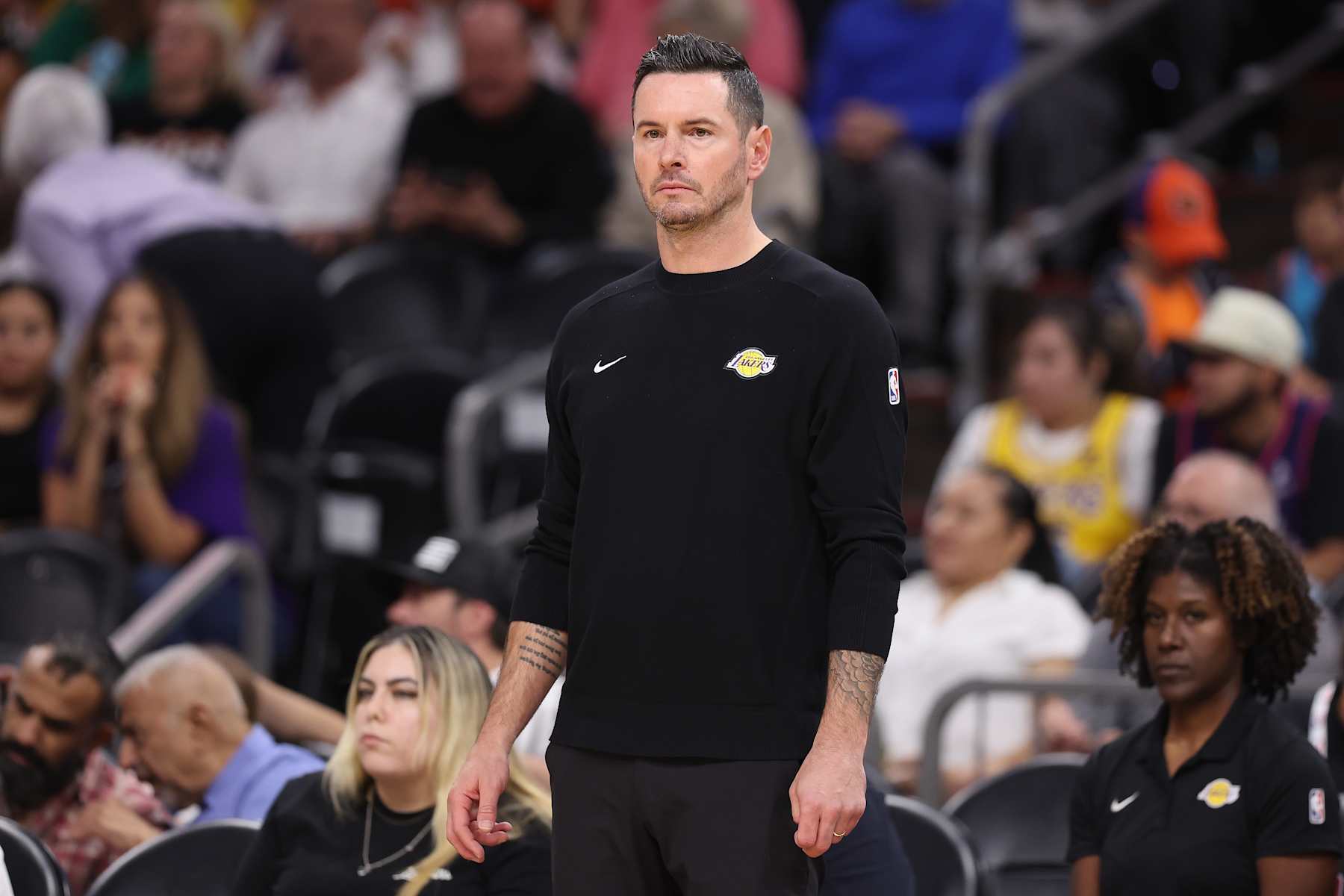 PHOENIX, ARIZONA - OCTOBER 17: Head coach JJ Redick of the Los Angeles Lakers looks on during the first half of the preseason NBA game against the Phoenix Suns at Footprint Center on October 17, 2024 in Phoenix, Arizona. NOTE TO USER: User expressly acknowledges and agrees that, by downloading and/or using this photograph, user is consenting to the terms and conditions of the Getty Images License Agreement.  (Photo by Christian Petersen/Getty Images)