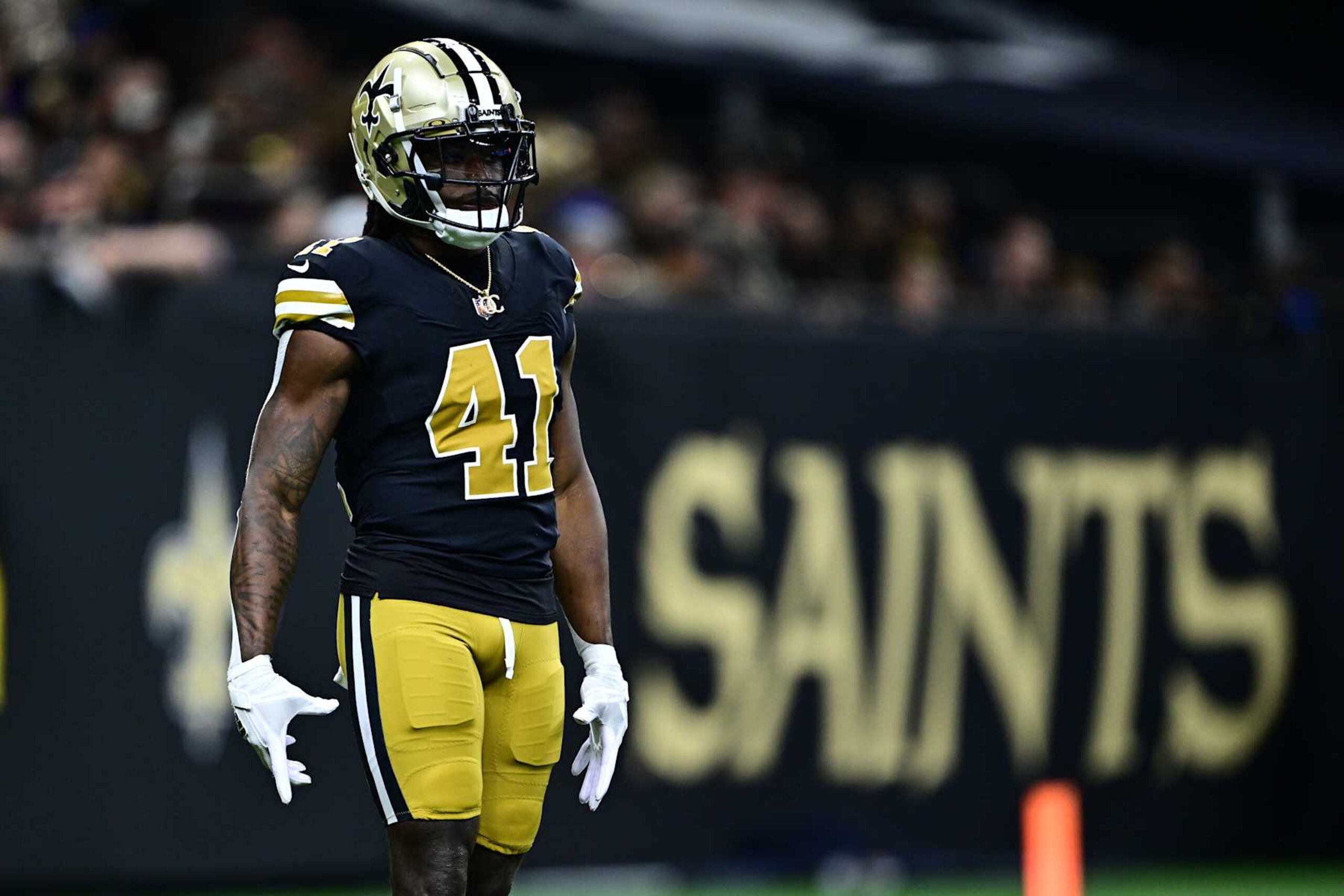 NEW ORLEANS, LOUISIANA - OCTOBER 17: Alvin Kamara #41 of the New Orleans Saints looks on against the Denver Broncos at Caesars Superdome on October 17, 2024 in New Orleans, Louisiana. (Photo by Gus Stark/Getty Images)