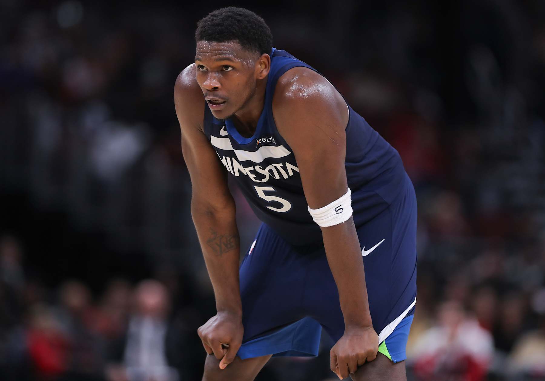 CHICAGO, IL - OCTOBER 16: Minnesota Timberwolves guard Anthony Edwards (5) looks on during the second half of a preseason game against the Chicago Bulls on October 16, 2024 at the United Center in Chicago, Illinois. (Photo by Melissa Tamez/Icon Sportswire via Getty Images)