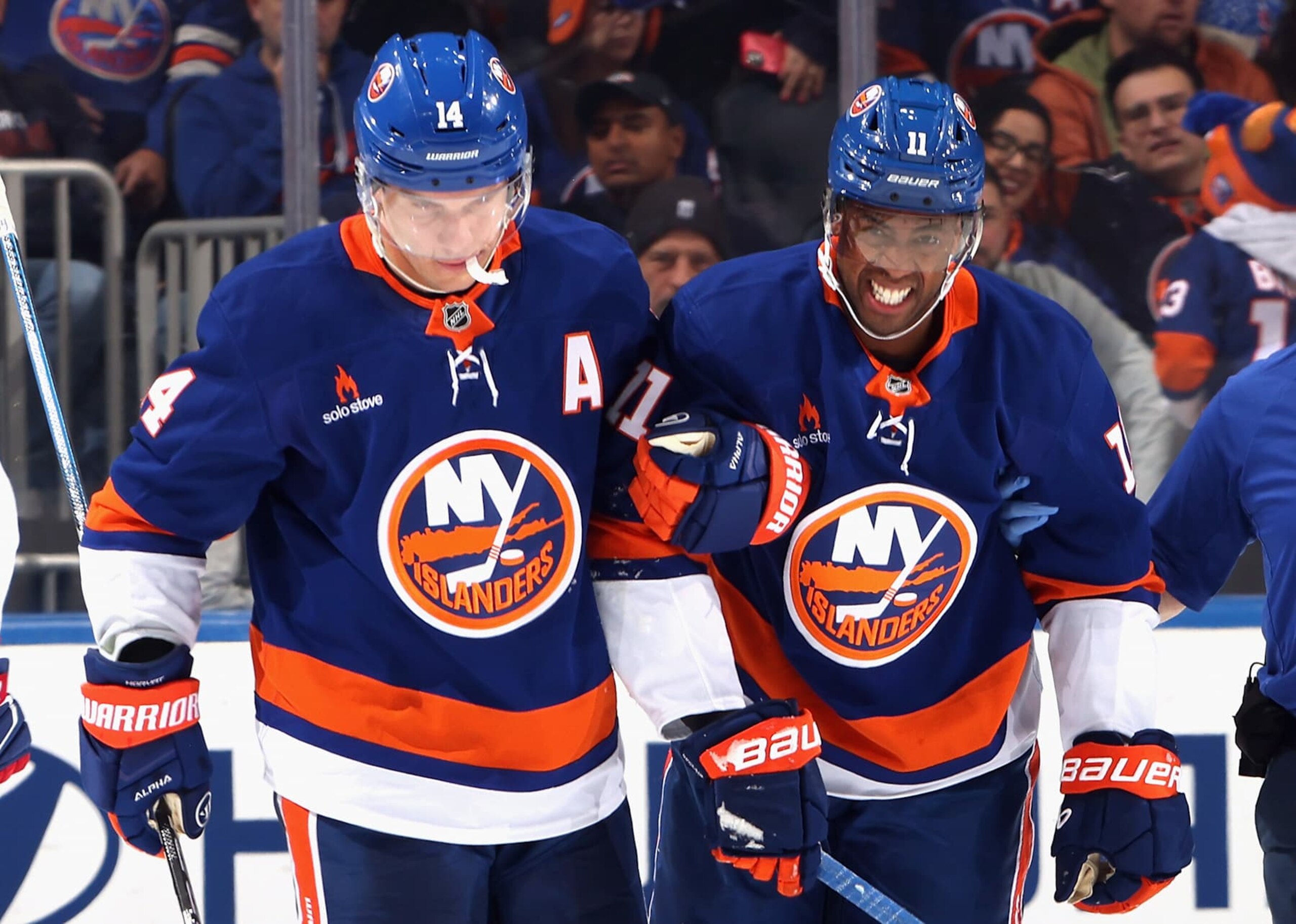 ELMONT, NEW YORK - OCTOBER 19: Bo Horvat #14 of the New York Islanders (L) assists Anthony Duclair #11 off the ice following a third period injury against the Montreal Canadiens at UBS Arena on October 19, 2024 in Elmont, New York. (Photo by Bruce Bennett/Getty Images) ELMONT, NEW YORK - OCTOBER 19: Bo Horvat #14 of the New York Islanders (L) assists Anthony Duclair #11 off the ice following a third period injury against the Montreal Canadiens at UBS Arena on October 19, 2024 in Elmont, New York. (Photo by Bruce Bennett/Getty Images)