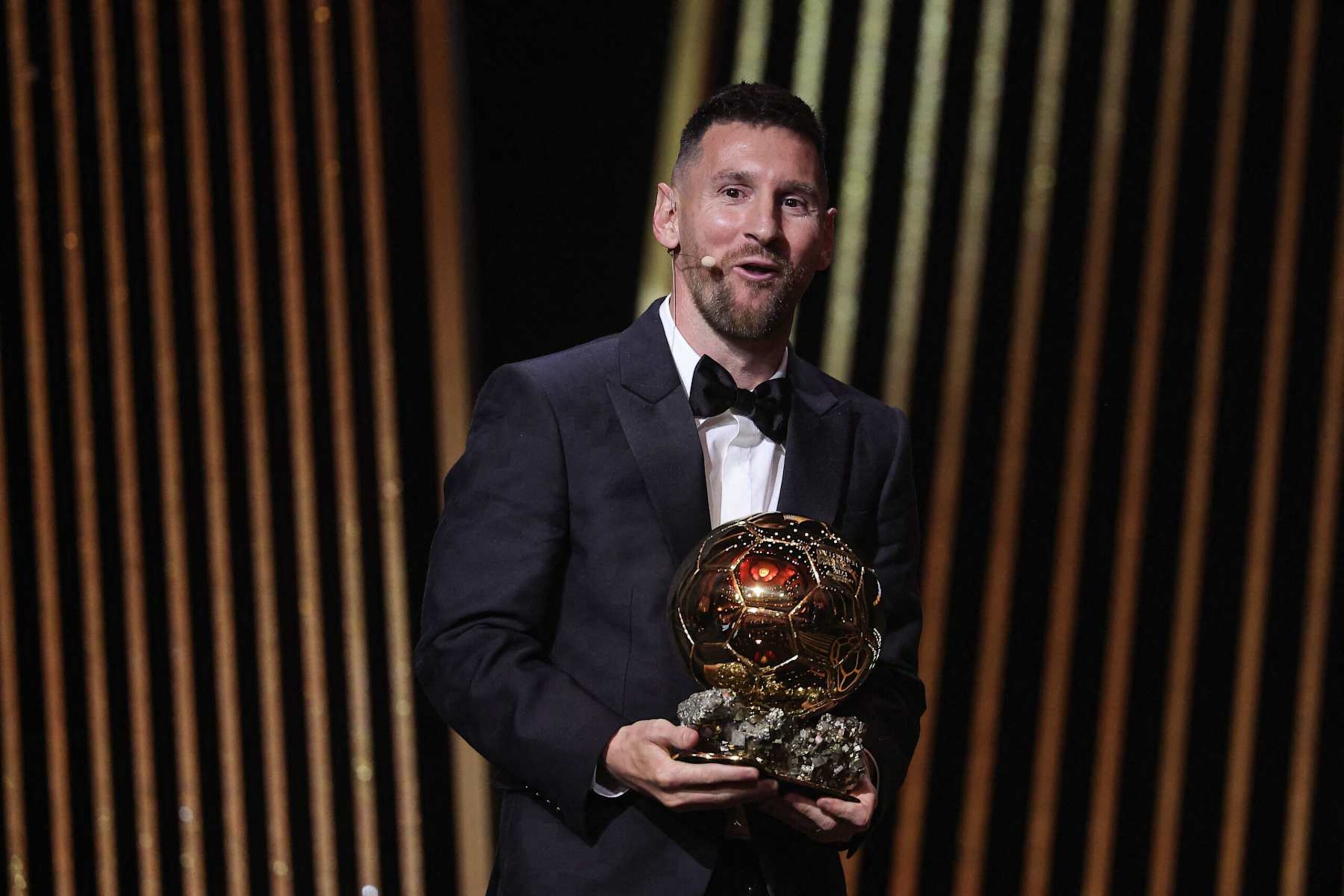 Inter Miami CF's Argentine forward Lionel Messi reacts on stage with his trophy as he receives his 8th Ballon d'Or award during the 2023 Ballon d'Or France Football award ceremony at the Theatre du Chatelet in Paris on October 30, 2023. (Photo by FRANCK FIFE / AFP) (Photo by FRANCK FIFE/AFP via Getty Images)