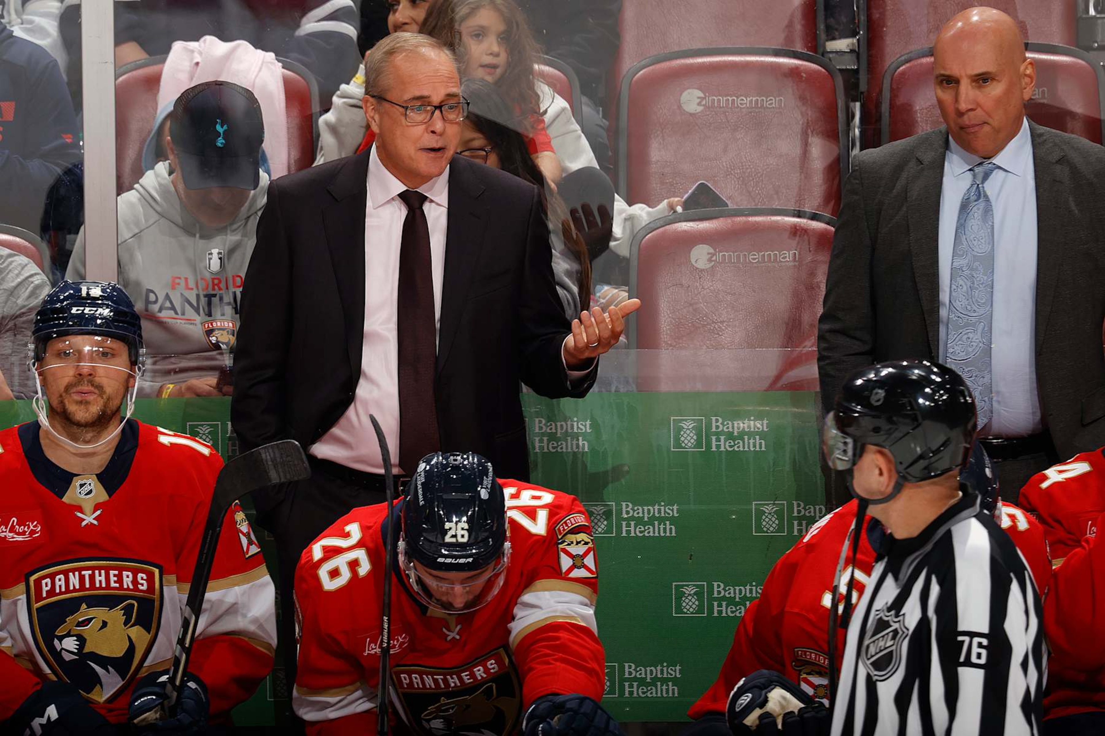 SUNRISE, FL - OCTOBER 17: Head coach Paul Maurice of the Florida Panthers talks to linesman Michel Cormier #76 during a break in action against the Vancouver Canucks during the third period at the Amerant Bank Arena on October 17, 2024 in Sunrise, Florida. (Photo by Joel Auerbach/Getty Images) SUNRISE, FL - OCTOBER 17: Head coach Paul Maurice of the Florida Panthers talks to linesman Michel Cormier #76 during a break in action against the Vancouver Canucks during the third period at the Amerant Bank Arena on October 17, 2024 in Sunrise, Florida. (Photo by Joel Auerbach/Getty Images)