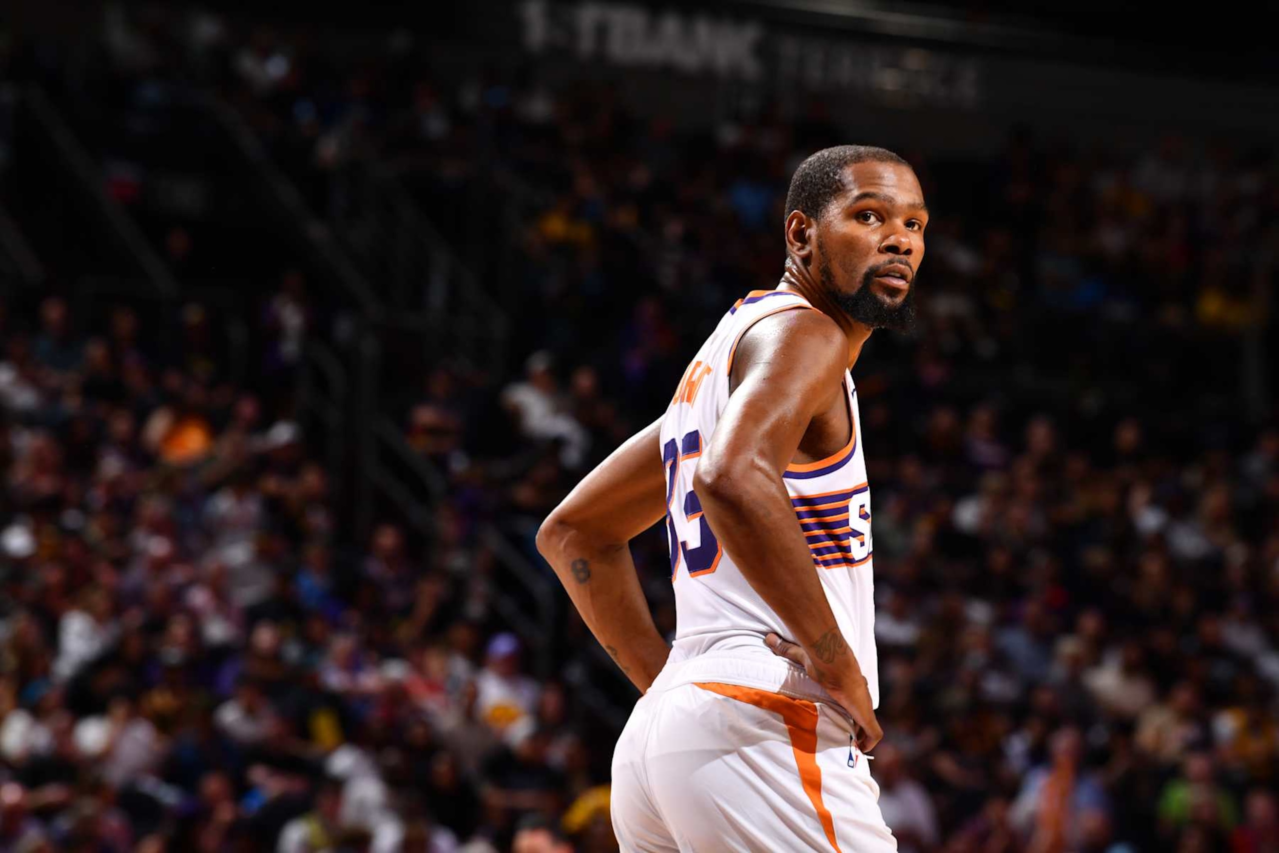 PHOENIX, AZ - OCTOBER 17: Kevin Durant #35 of the Phoenix Suns looks on during the game against the Los Angeles Lakers during a NBA Preseason game on October 17, 2024 at Footprint Center in Phoenix, Arizona. NOTE TO USER: User expressly acknowledges and agrees that, by downloading and or using this photograph, user is consenting to the terms and conditions of the Getty Images License Agreement. Mandatory Copyright Notice: Copyright 2024 NBAE (Photo by Barry Gossage/NBAE via Getty Images) PHOENIX, AZ - OCTOBER 17: Kevin Durant #35 of the Phoenix Suns looks on during the game against the Los Angeles Lakers during a NBA Preseason game on October 17, 2024 at Footprint Center in Phoenix, Arizona. NOTE TO USER: User expressly acknowledges and agrees that, by downloading and or using this photograph, user is consenting to the terms and conditions of the Getty Images License Agreement. Mandatory Copyright Notice: Copyright 2024 NBAE (Photo by Barry Gossage/NBAE via Getty Images)