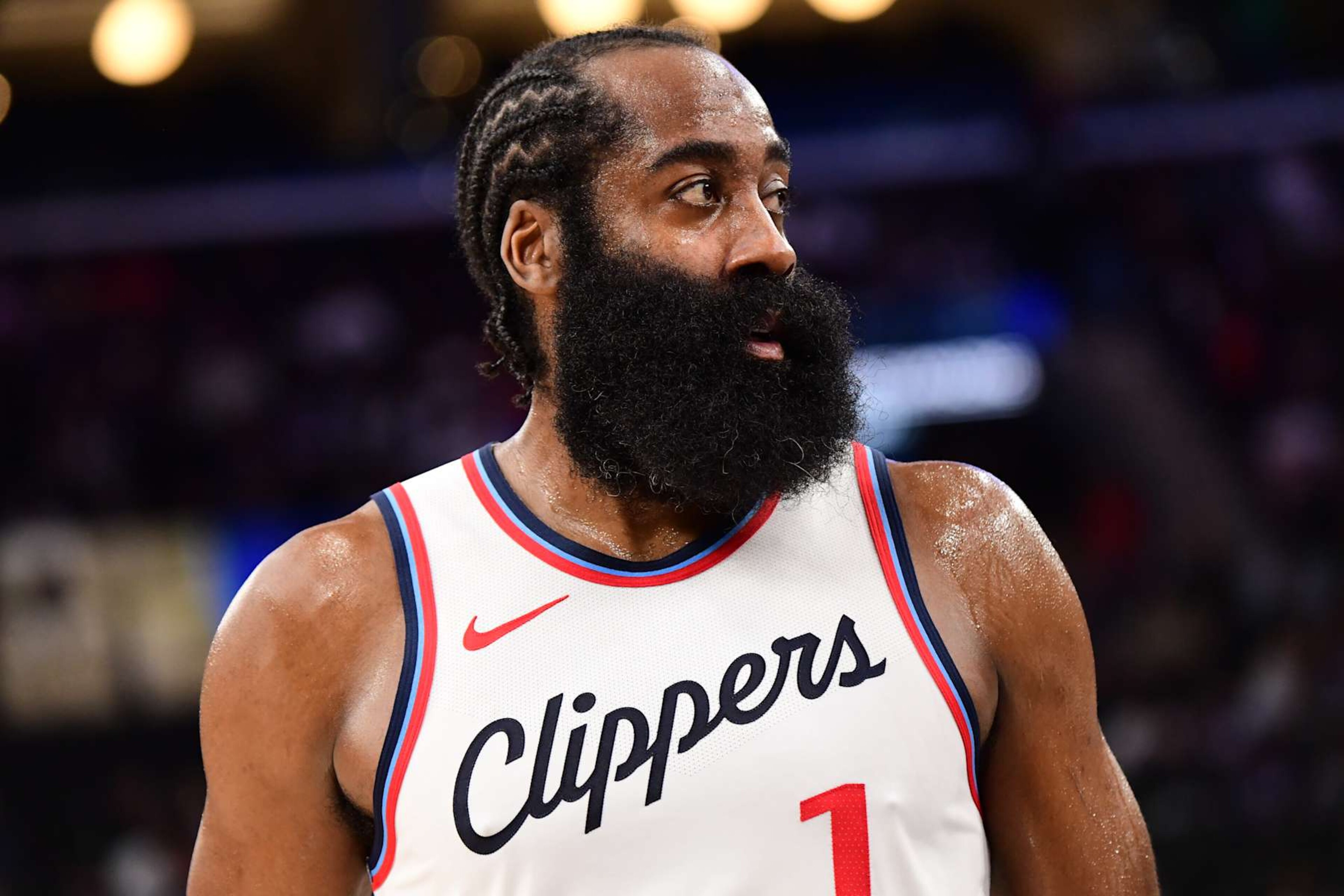 INGLEWOOD, CA - OCTOBER 14: James Harden #1 of the LA Clippers looks on during the game against the Dallas Mavericks during a NBA Preseason game on October 14, 2024 at the Intuit Dome in Inglewood, California. NOTE TO USER: User expressly acknowledges and agrees that, by downloading and/or using this Photograph, user is consenting to the terms and conditions of the Getty Images License Agreement. Mandatory Copyright Notice: Copyright 2024 NBAE (Photo by Adam Pantozzi/NBAE via Getty Images) INGLEWOOD, CA - OCTOBER 14: James Harden #1 of the LA Clippers looks on during the game against the Dallas Mavericks during a NBA Preseason game on October 14, 2024 at the Intuit Dome in Inglewood, California. NOTE TO USER: User expressly acknowledges and agrees that, by downloading and/or using this Photograph, user is consenting to the terms and conditions of the Getty Images License Agreement. Mandatory Copyright Notice: Copyright 2024 NBAE (Photo by Adam Pantozzi/NBAE via Getty Images)