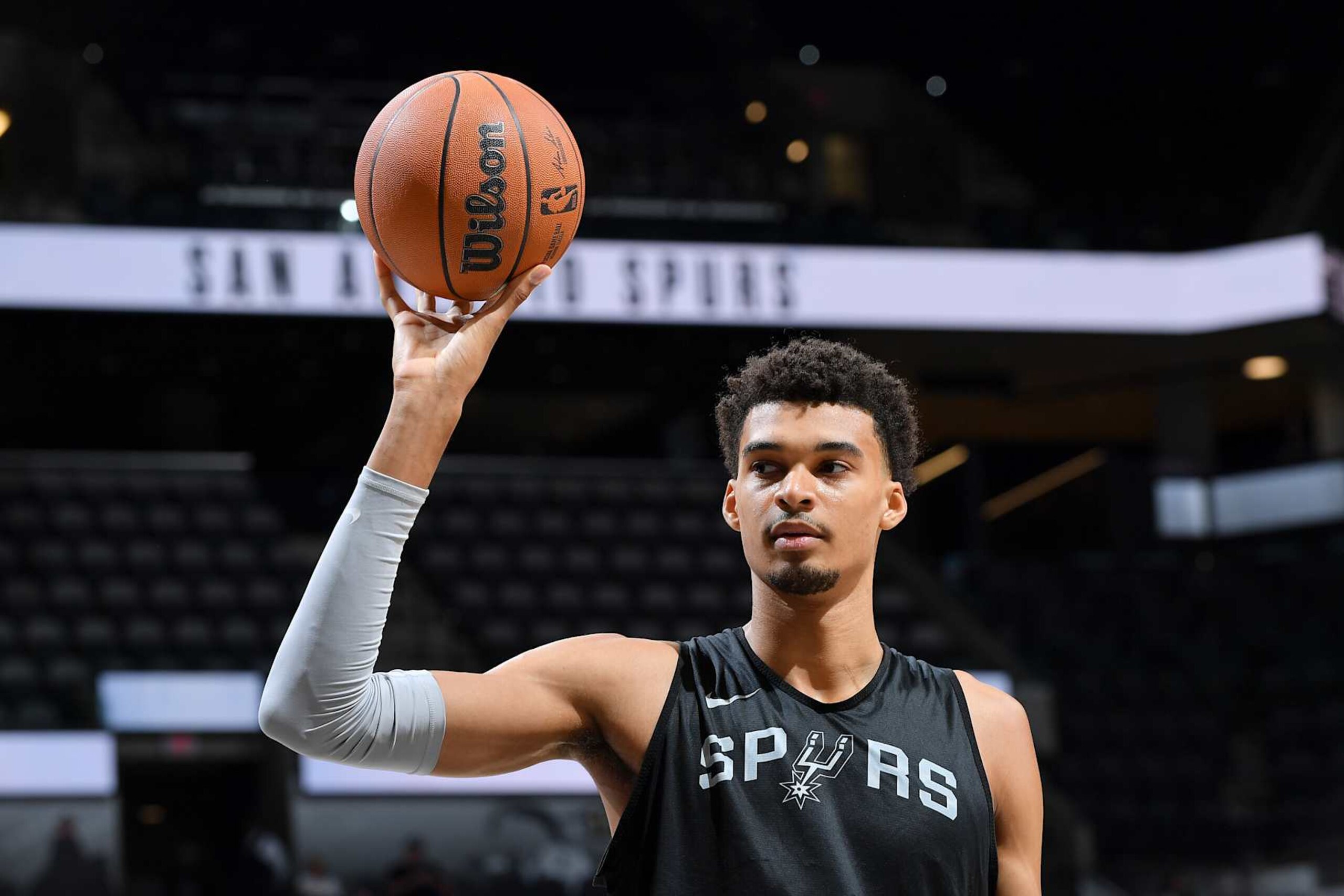 San Antonio TX, - October 19, 2024: Victor Wembanyama #1 of the San Antonio Spurs holds a basketball5 during the Spurs Open Scrimmage on October 19, 2024 at the Frost Bank Center in San Antonio, Texas. NOTE TO USER: User expressly acknowledges and agrees that, by downloading and or using this photograph, user is consenting to the terms and conditions of the Getty Images License Agreement. Mandatory Copyright Notice: Copyright 2024 NBAE (Photos by Michael Gonzales/NBAE via Getty Images)