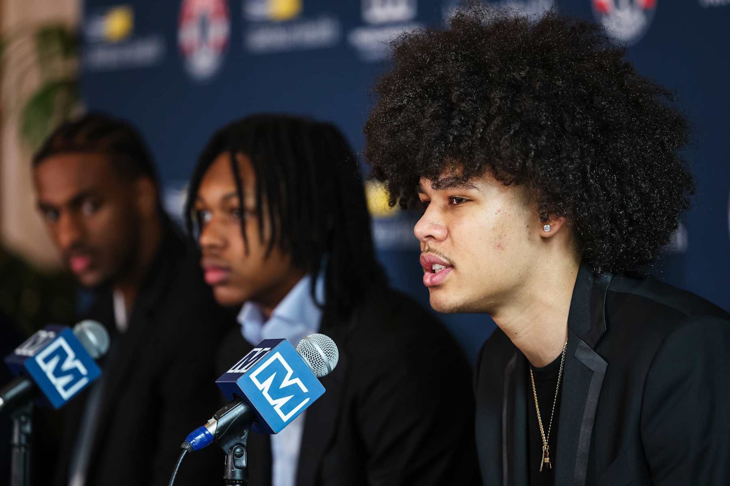 WASHINGTON, DC - JUNE 29: (L-R) Alex Sarr #12, Bub Carrington #17, and Kyshawn George #18 of the Washington Wizards address the media as the Washington Wizards introduce their 2024 draft picks at Union Station on June 29, 2024 in Washington, DC. NOTE TO USER: User expressly acknowledges and agrees that, by downloading and or using this photograph, User is consenting to the terms and conditions of the Getty Images License Agreement. (Photo by Scott Taetsch/Getty Images)