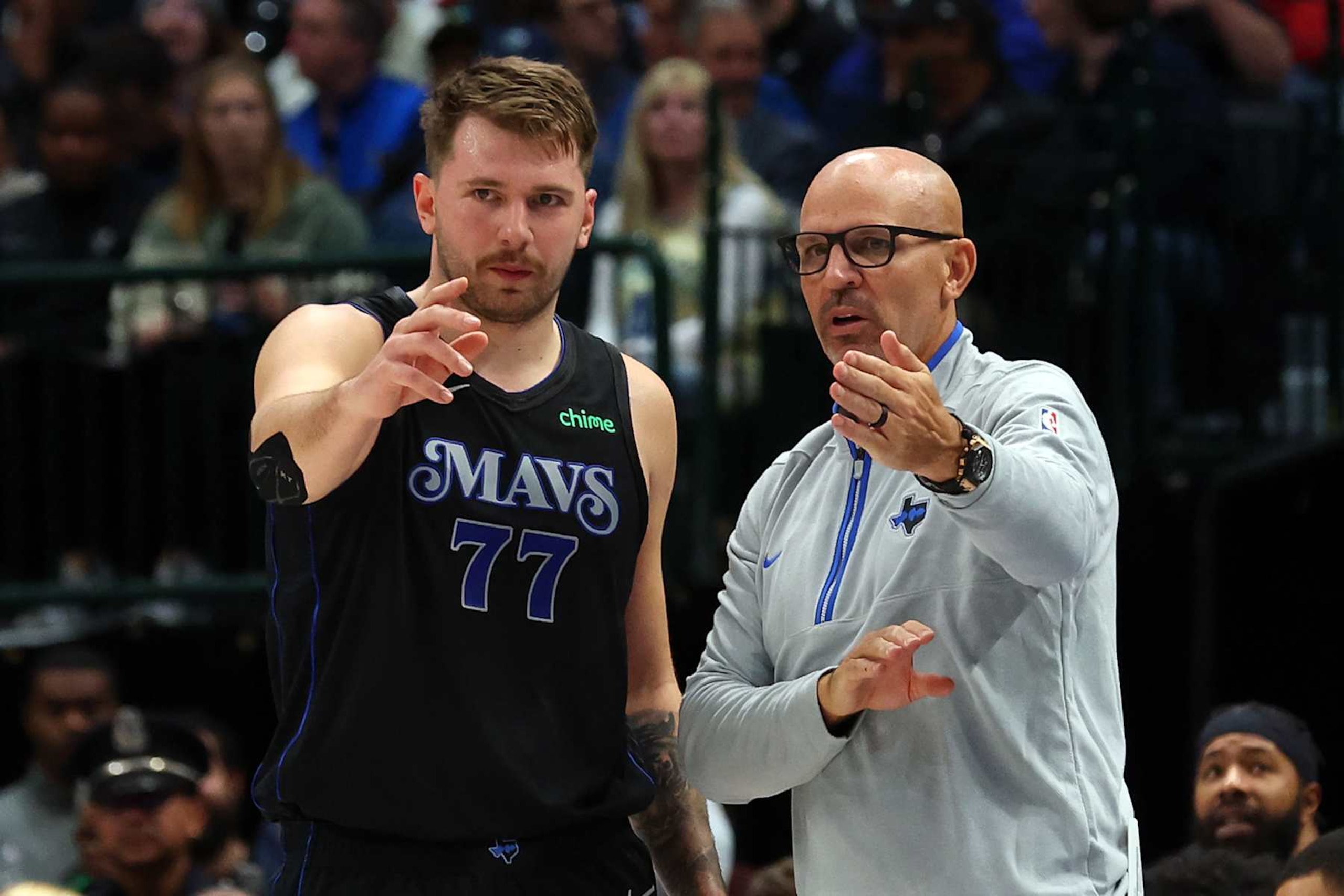 DALLAS, TEXAS - NOVEMBER 10: Luka Doncic #77 of the Dallas Mavericks talks with head coach Jason Kidd in the first half of the NBA In-Season Tournament game against the LA Clippers at American Airlines Center on November 10, 2023 in Dallas, Texas. NOTE TO USER: User expressly acknowledges and agrees that, by downloading and or using this photograph, User is consenting to the terms and conditions of the Getty Images License Agreement. (Photo by Richard Rodriguez/Getty Images)