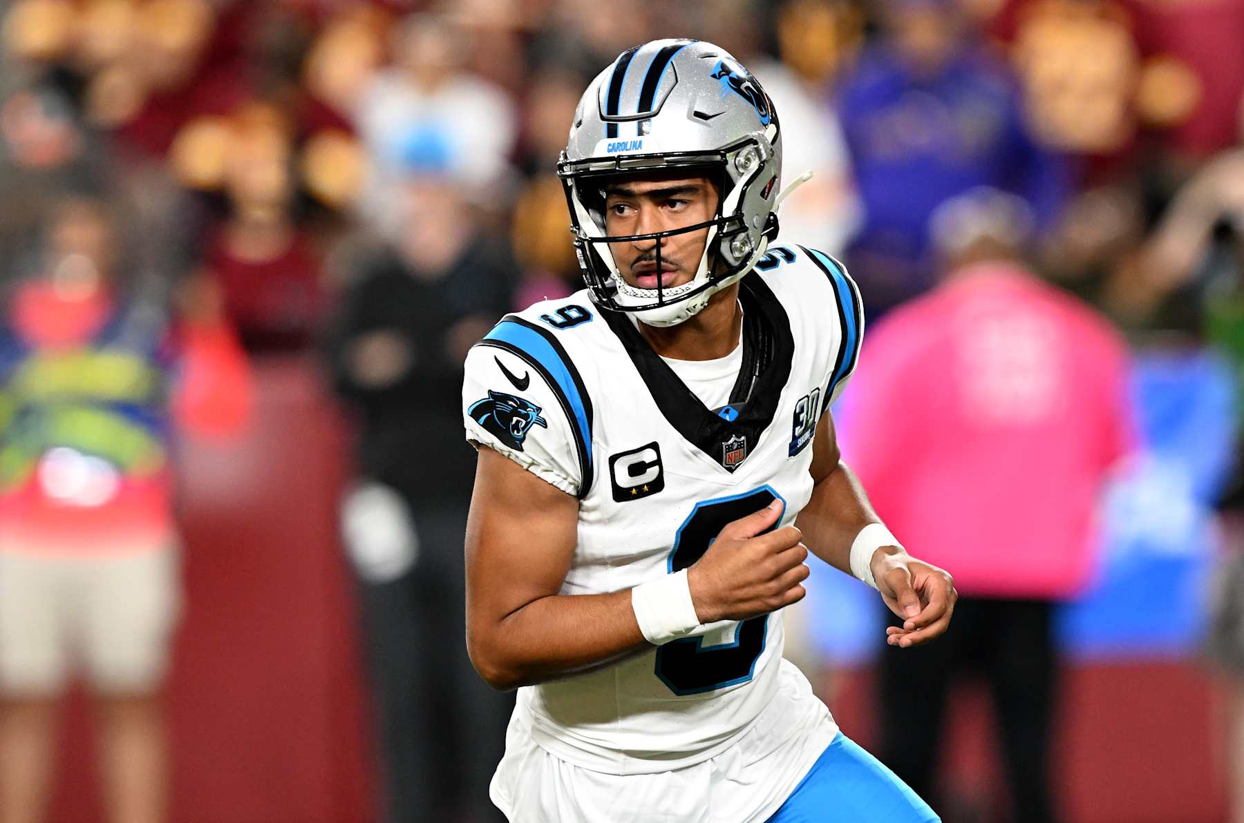 LANDOVER, MARYLAND - OCTOBER 20: Bryce Young #9 of the Carolina Panthers plays against the Washington Commanders at Northwest Stadium on October 20, 2024 in Landover, Maryland. (Photo by G Fiume/Getty Images)