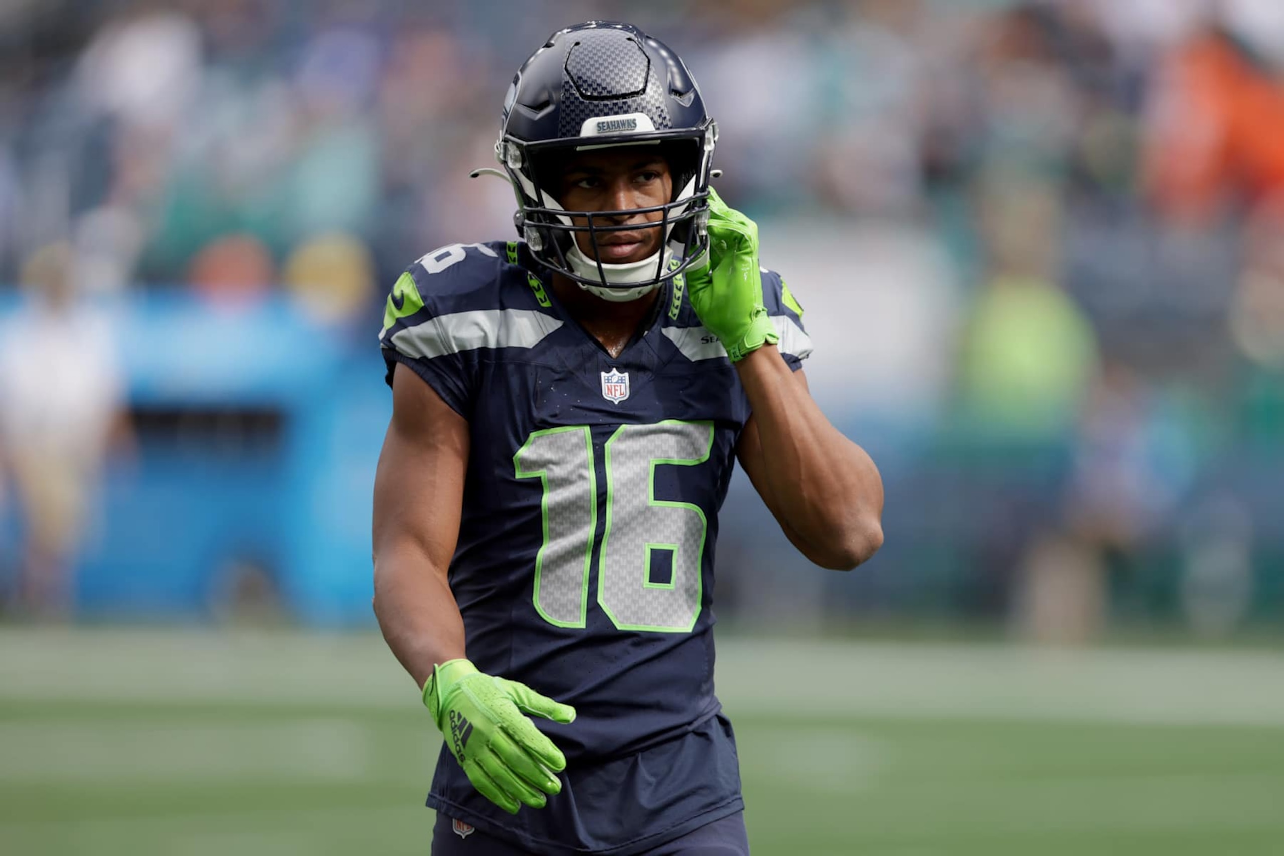 SEATTLE, WASHINGTON - SEPTEMBER 22: Tyler Lockett #16 of the Seattle Seahawks heads to the locker room after warm ups prior to a game against the Miami Dolphins at Lumen Field on September 22, 2024 in Seattle, Washington. (Photo by Rio Giancarlo/Getty Images)