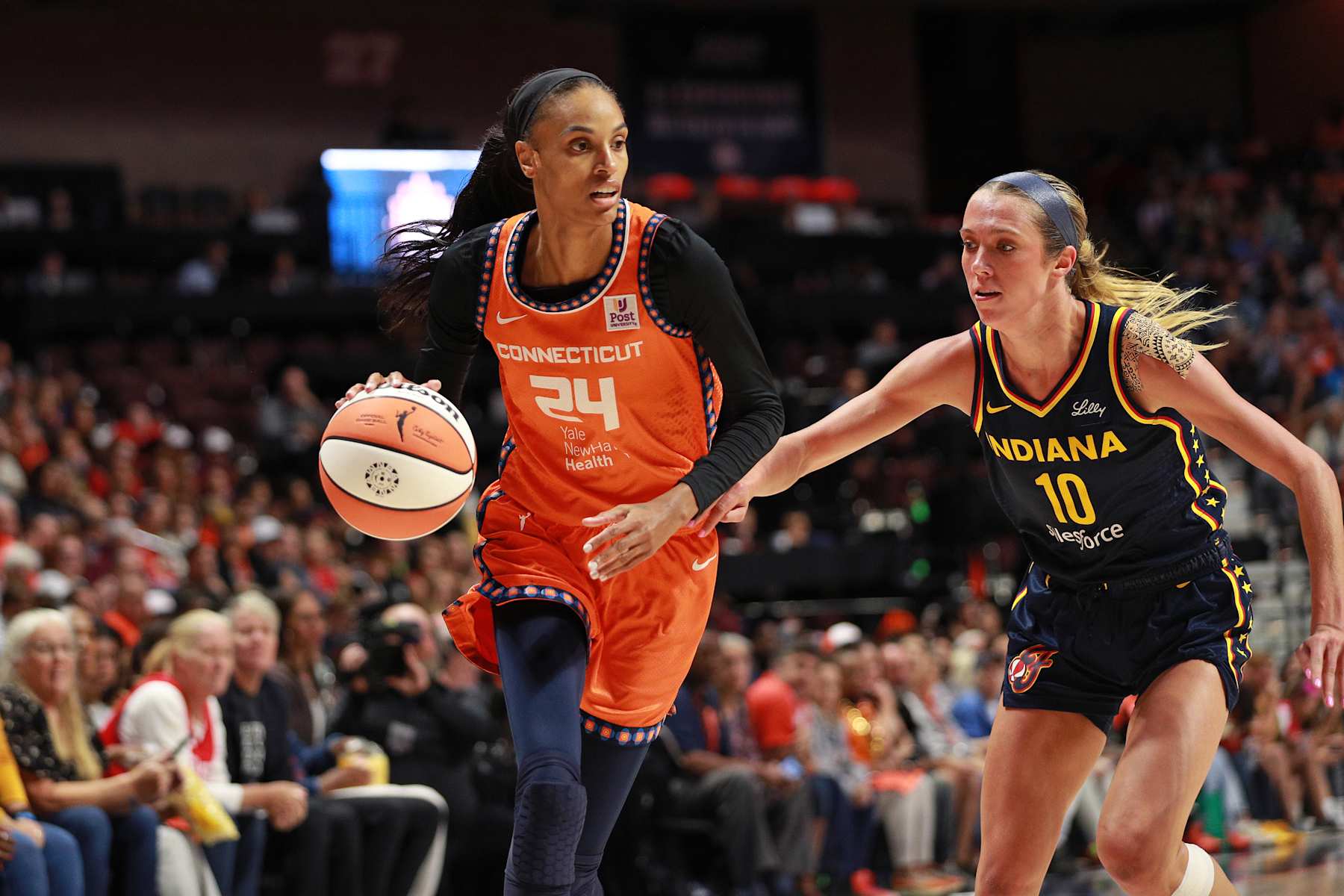 UNCASVILLE, CT - SEPTEMBER 22: DeWanna Bonner #24 of the Connecticut Sun drives the basket during the game against the Indiana Fever during round one game one of the 2024 WNBA Playoffs on September 22, 2024 at the Mohegan Sun Arena in Uncasville, Connecticut. NOTE TO USER: User expressly acknowledges and agrees that, by downloading and or using this photograph, User is consenting to the terms and conditions of the Getty Images License Agreement. Mandatory Copyright Notice: Copyright 2024 NBAE (Photo by Chris Marion/NBAE via Getty Images)