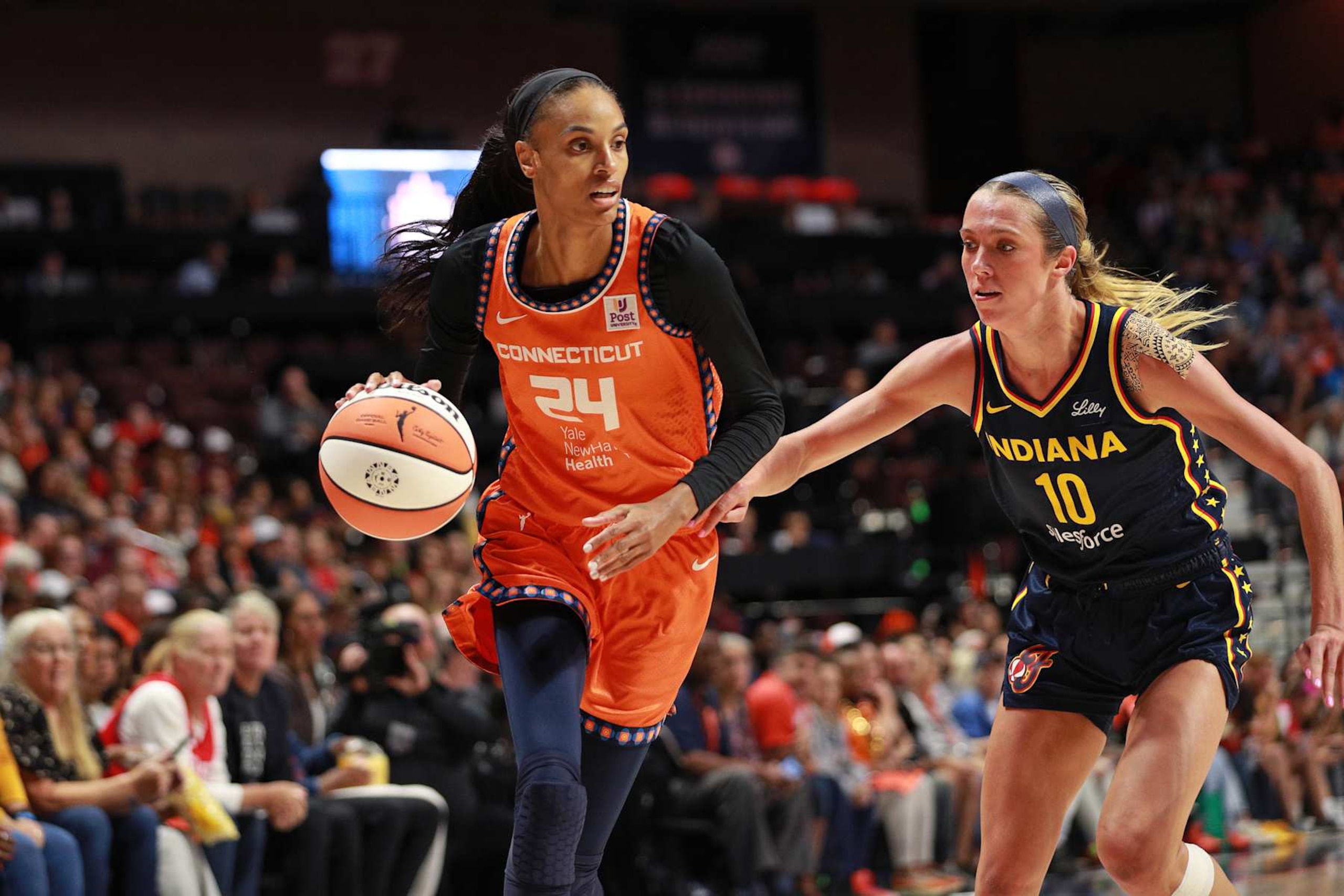 UNCASVILLE, CT - SEPTEMBER 22: DeWanna Bonner #24 of the Connecticut Sun drives the basket during the game against the Indiana Fever during round one game one of the 2024 WNBA Playoffs on September 22, 2024 at the Mohegan Sun Arena in Uncasville, Connecticut. NOTE TO USER: User expressly acknowledges and agrees that, by downloading and or using this photograph, User is consenting to the terms and conditions of the Getty Images License Agreement. Mandatory Copyright Notice: Copyright 2024 NBAE (Photo by Chris Marion/NBAE via Getty Images)