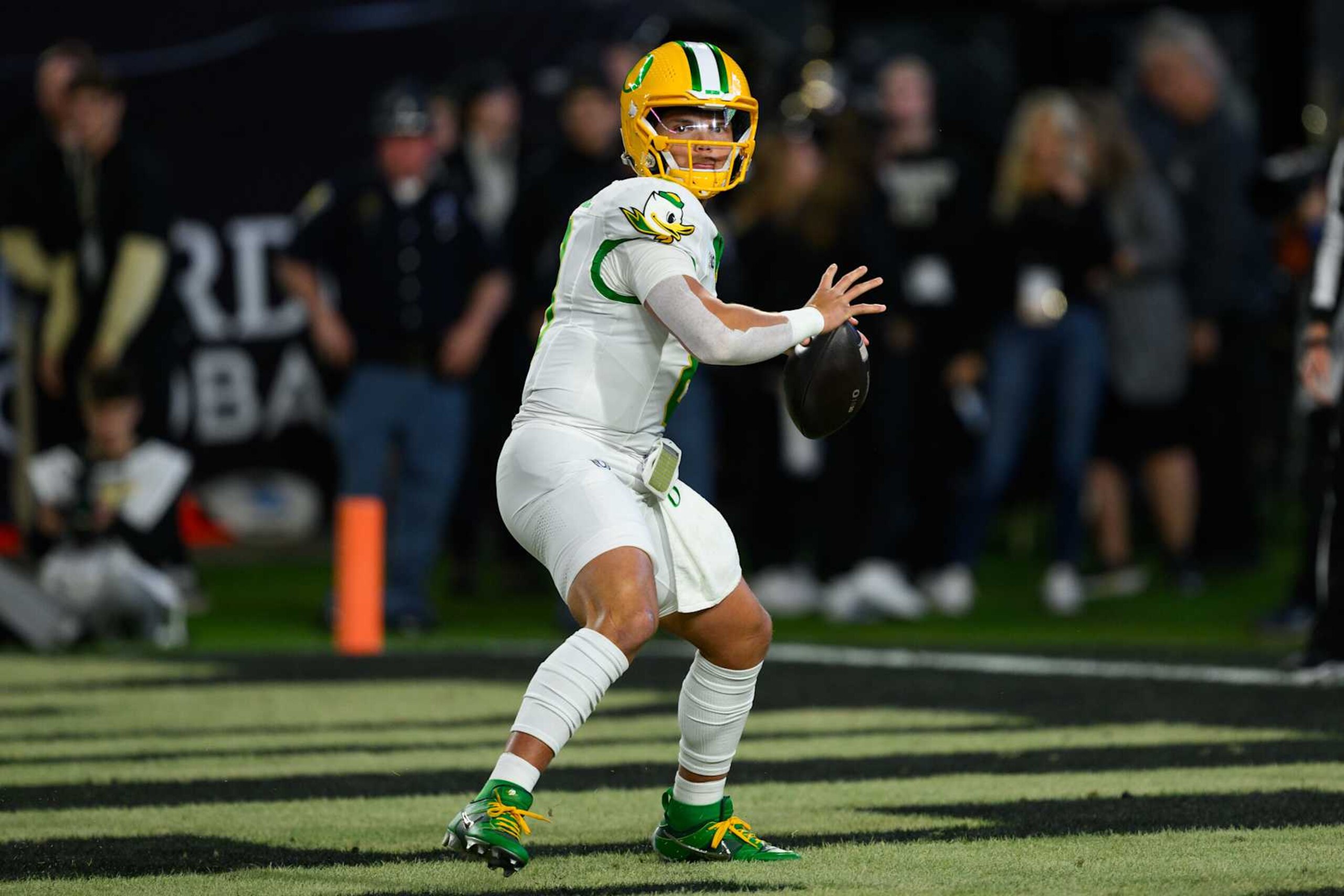 WEST LAFAYETTE, IN - OCTOBER 18: Oregon Ducks quarterback Dillon Gabriel (8) looks downfield during the college football game between the Purdue Boilermakers and Oregon Ducks on October 18, 2024, at Ross-Ade Stadium in West Lafayette, IN. (Photo by Zach Bolinger/Icon Sportswire via Getty Images)