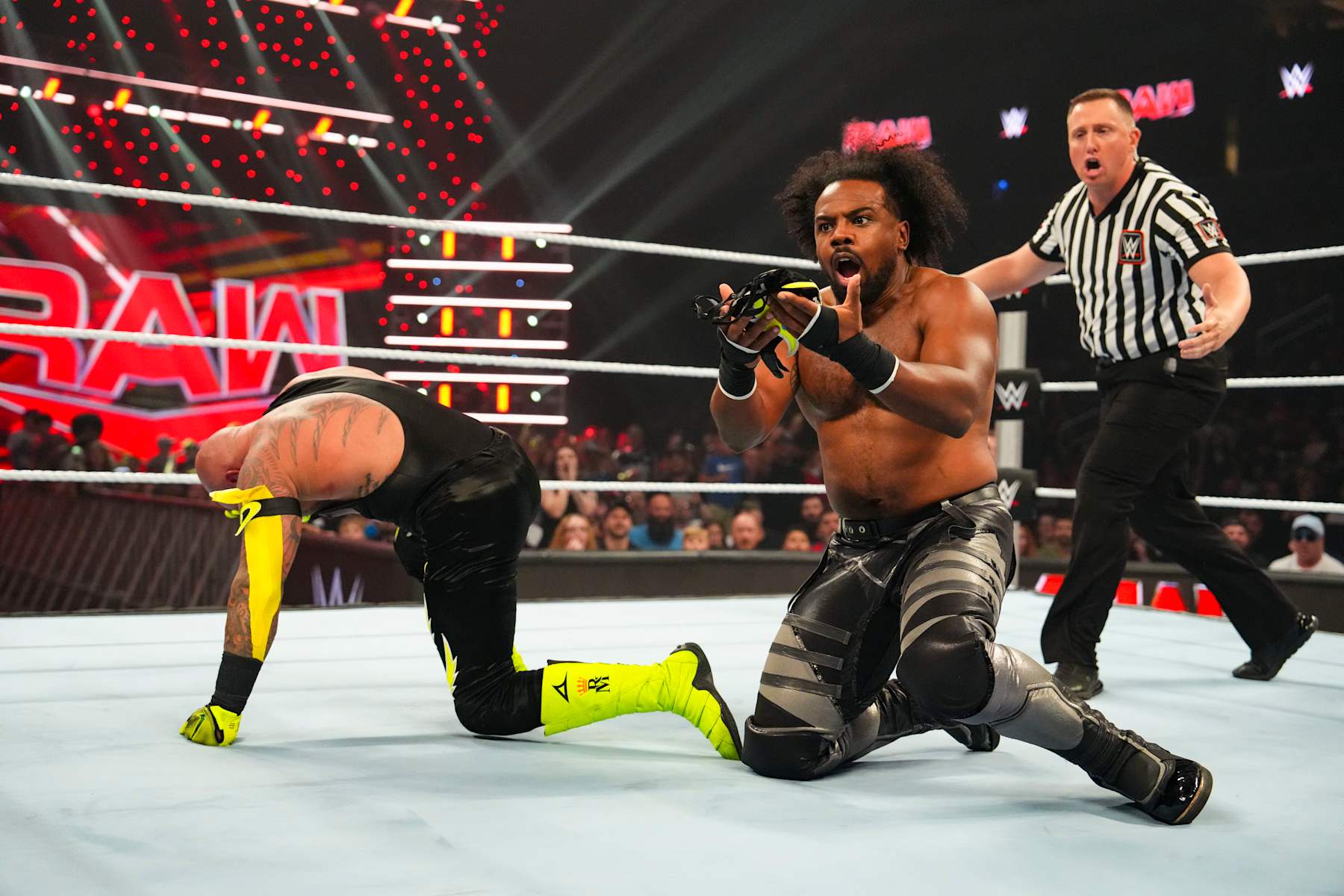 EVANSVILLE, INDIANA - SEPTEMBER 30: Xavier Woods unmasks Rey Mysterio during Monday night RAW at Ford Center on September 30, 2024 in Evansville, Indiana.  (Photo by WWE/Getty Images)
