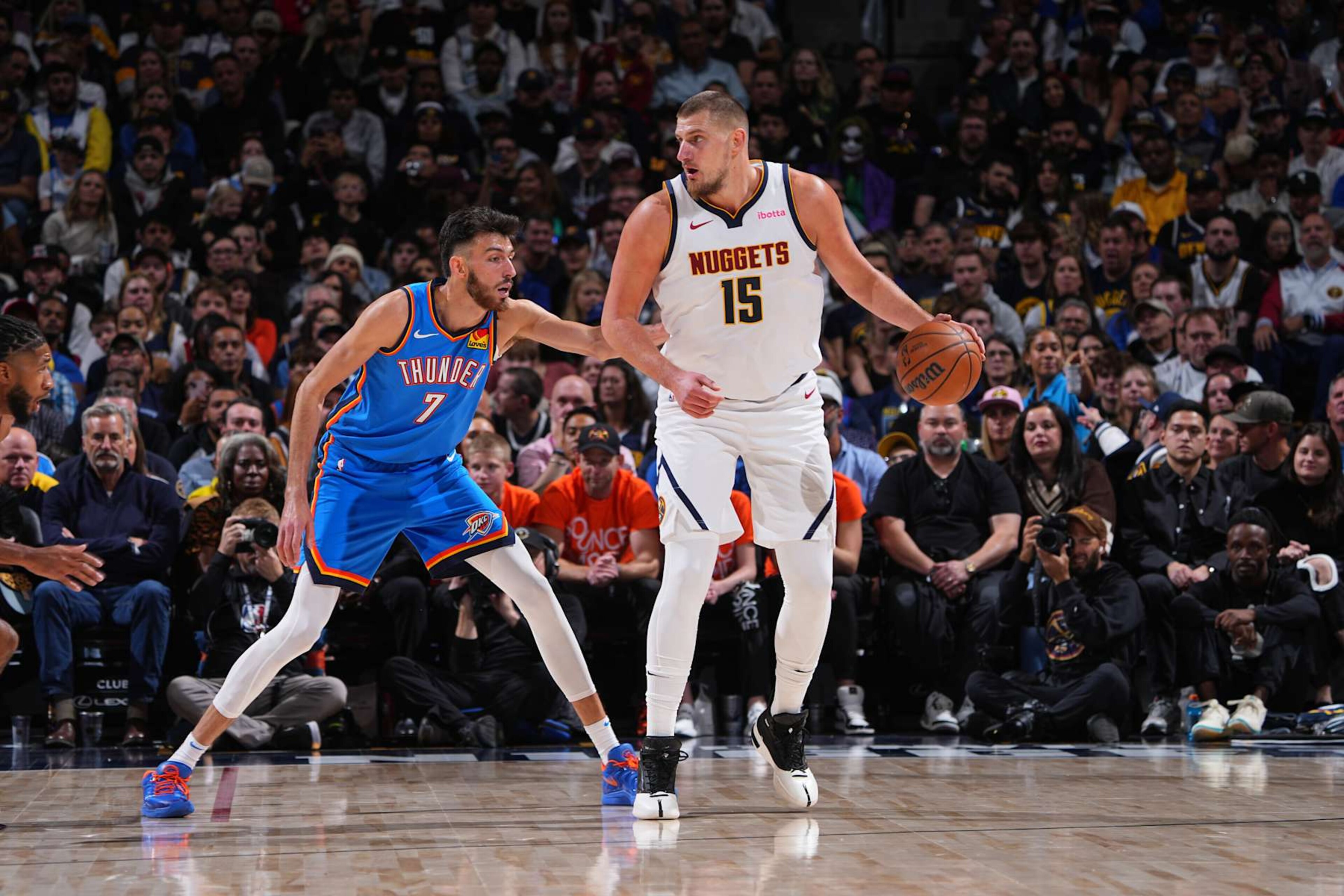 DENVER, CO - OCTOBER 24: Nikola Jokic #15 of the Denver Nuggets dribbles the ball during the game against the Oklahoma City Thunder on October 24, 2024 at Ball Arena in Denver, Colorado. NOTE TO USER: User expressly acknowledges and agrees that, by downloading and/or using this Photograph, user is consenting to the terms and conditions of the Getty Images License Agreement. Mandatory Copyright Notice: Copyright 2024 NBAE (Photo by Garrett Ellwood/NBAE via Getty Images) DENVER, CO - OCTOBER 24: Nikola Jokic #15 of the Denver Nuggets dribbles the ball during the game against the Oklahoma City Thunder on October 24, 2024 at Ball Arena in Denver, Colorado. NOTE TO USER: User expressly acknowledges and agrees that, by downloading and/or using this Photograph, user is consenting to the terms and conditions of the Getty Images License Agreement. Mandatory Copyright Notice: Copyright 2024 NBAE (Photo by Garrett Ellwood/NBAE via Getty Images)