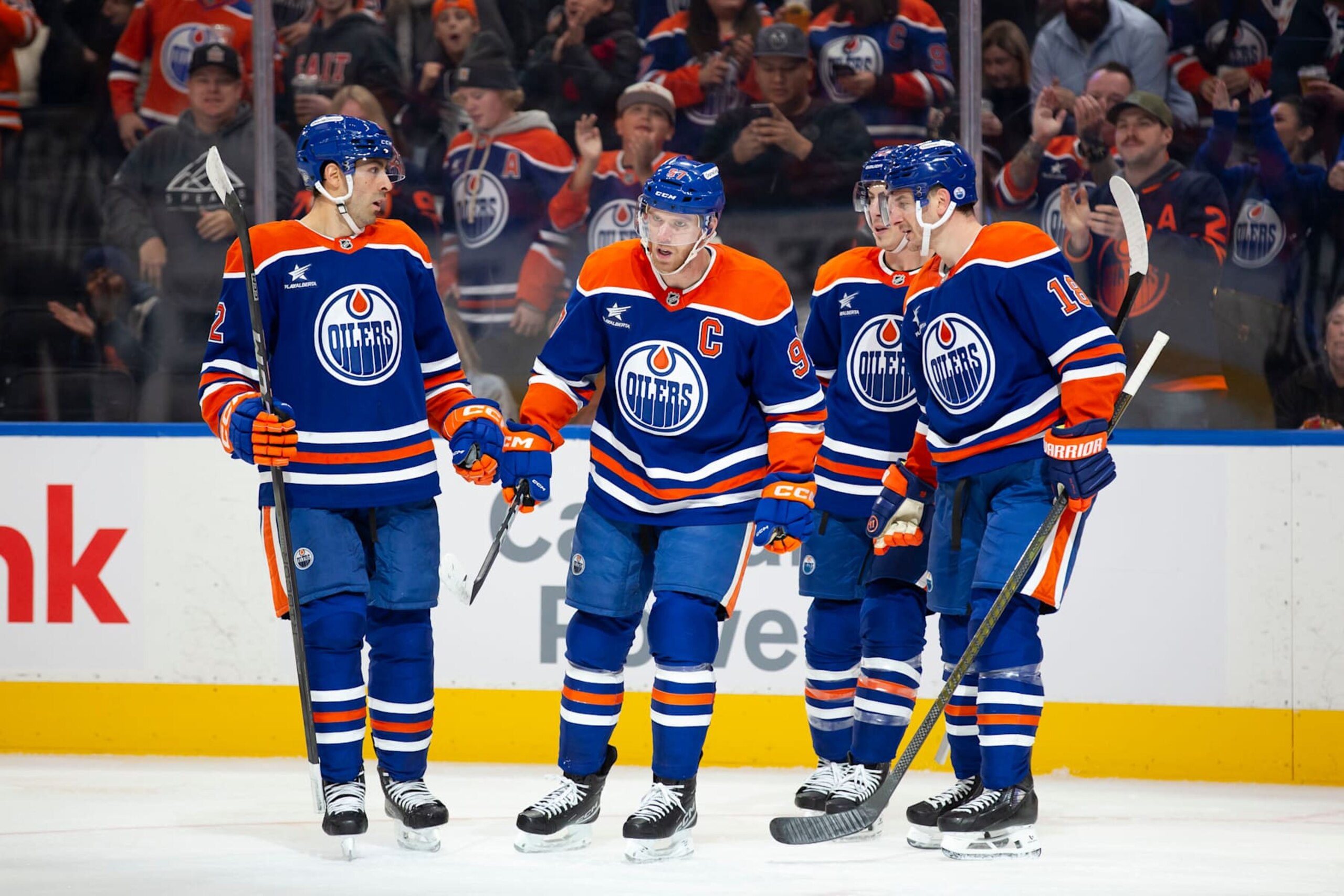 EDMONTON, CANADA - OCTOBER 22: Evan Bouchard #2, Connor McDavid #97, Ryan Nugent-Hopkins #93 and Zach Hyman #18 of the Edmonton Oilers celebrate a goal against the Carolina Hurricanes during the second period at Rogers Place on October 22, 2024 in Edmonton, Canada. (Photo by Codie McLachlan/Getty Images) EDMONTON, CANADA - OCTOBER 22: Evan Bouchard #2, Connor McDavid #97, Ryan Nugent-Hopkins #93 and Zach Hyman #18 of the Edmonton Oilers celebrate a goal against the Carolina Hurricanes during the second period at Rogers Place on October 22, 2024 in Edmonton, Canada. (Photo by Codie McLachlan/Getty Images)