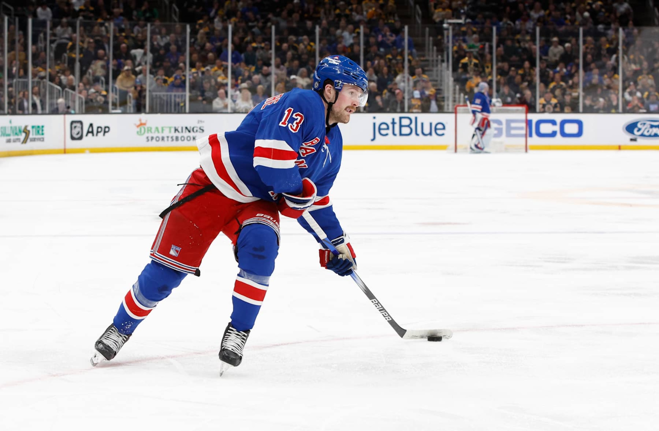 BOSTON, MASSACHUSETTS - MARCH 21: Alexis Lafreniere #13 of the New York Rangers skates against the Boston Bruins during the second period at the TD Garden on March 21, 2024 in Boston, Massachusetts. The Rangers won 5-2. (Photo by Richard T Gagnon/Getty Images)