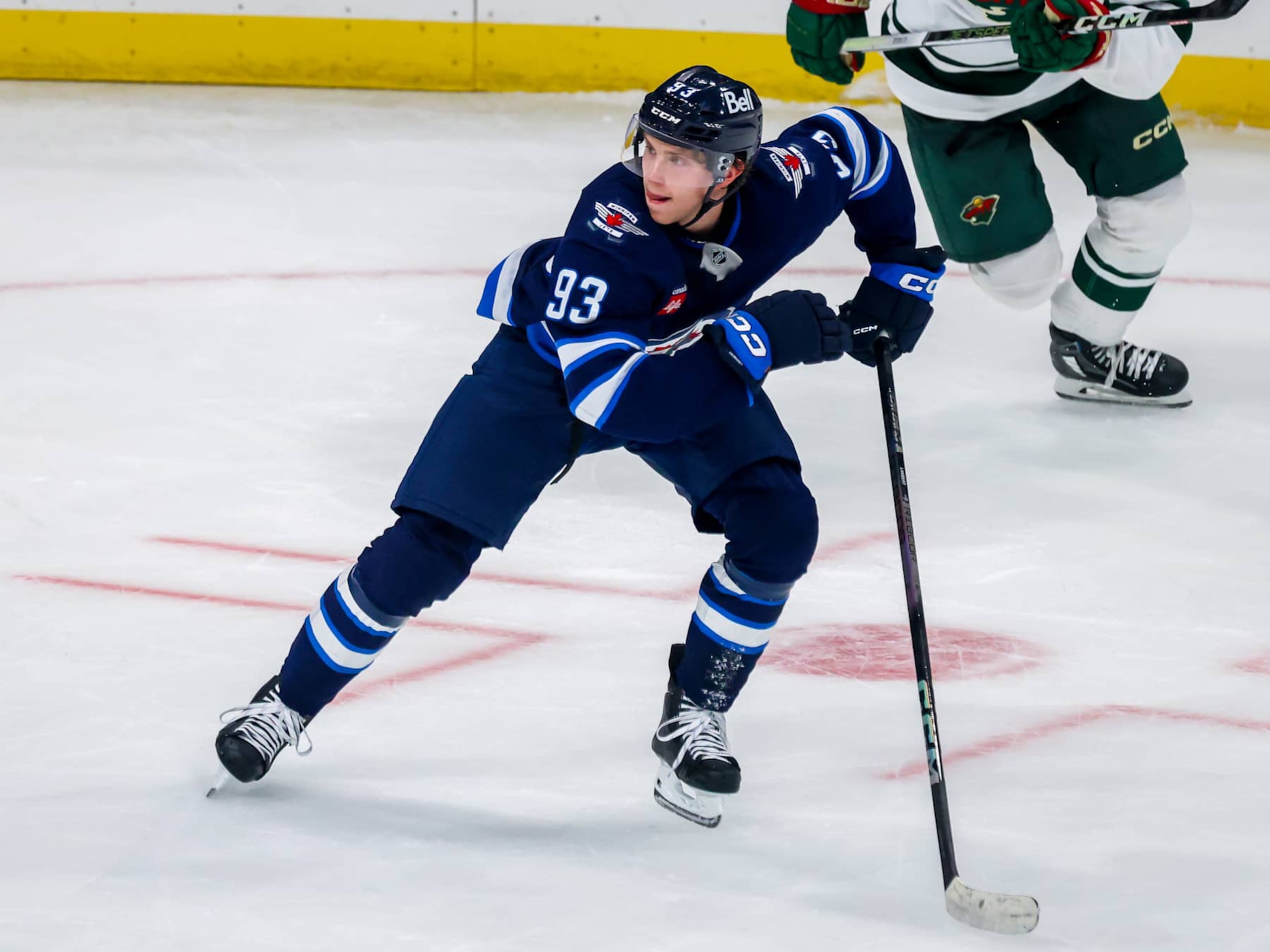 WINNIPEG, CANADA - SEPTEMBER 21: Brad Lambert #93 of the Winnipeg Jets skates during third period action against the Minnesota Wild in a preseason game at Canada Life Centre on September 21, 2024 in Winnipeg, Manitoba, Canada. (Photo by Jonathan Kozub/NHLI via Getty Images)