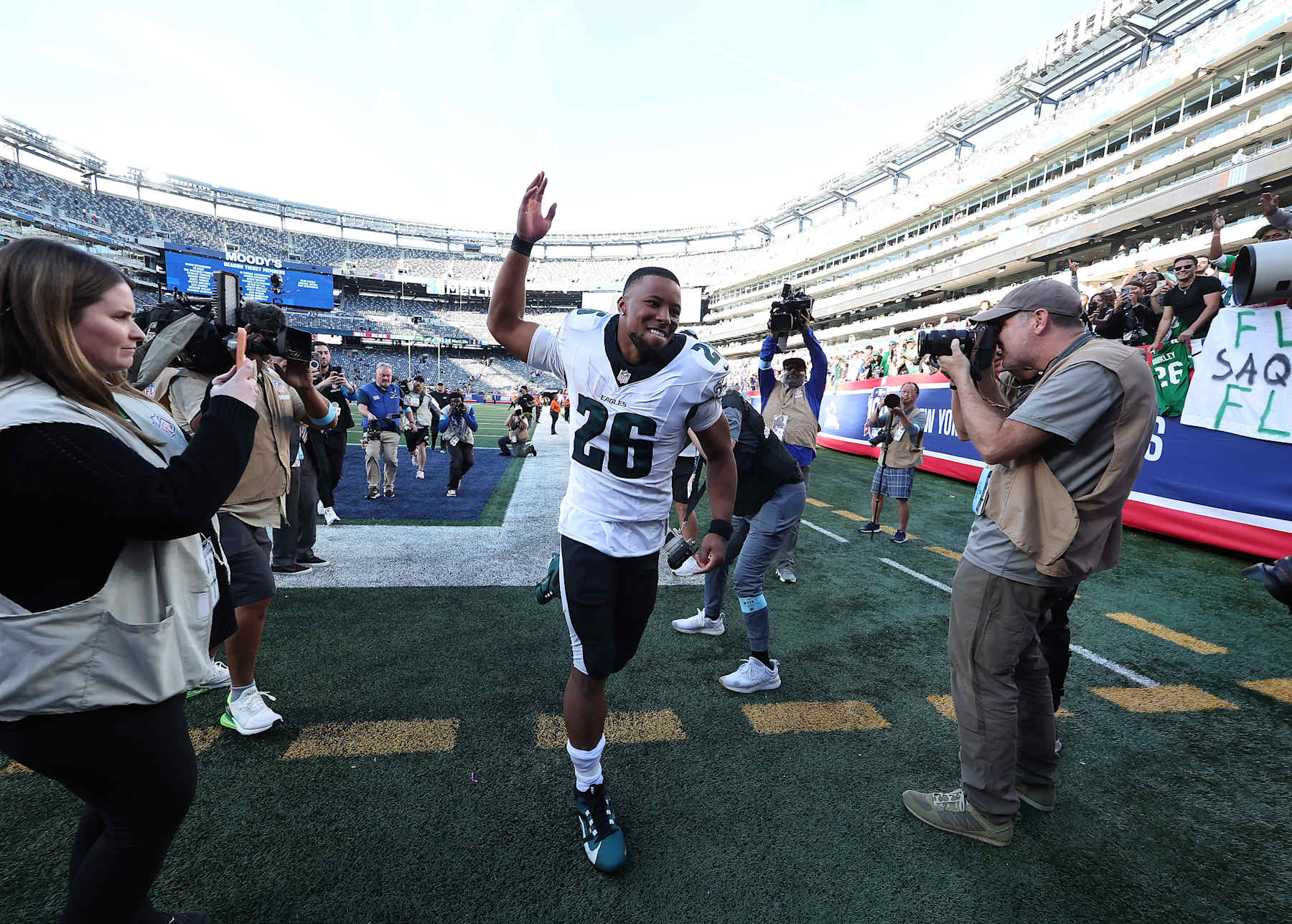 EAST RUTHERFORD, NEW JERSEY - OCTOBER 20: Saquon Barkley #26 of the Philadelphia Eagles celebrates after defeating the New York Giants 28-3 at MetLife Stadium on October 20, 2024 in East Rutherford, New Jersey. (Photo by Al Bello/Getty Images)