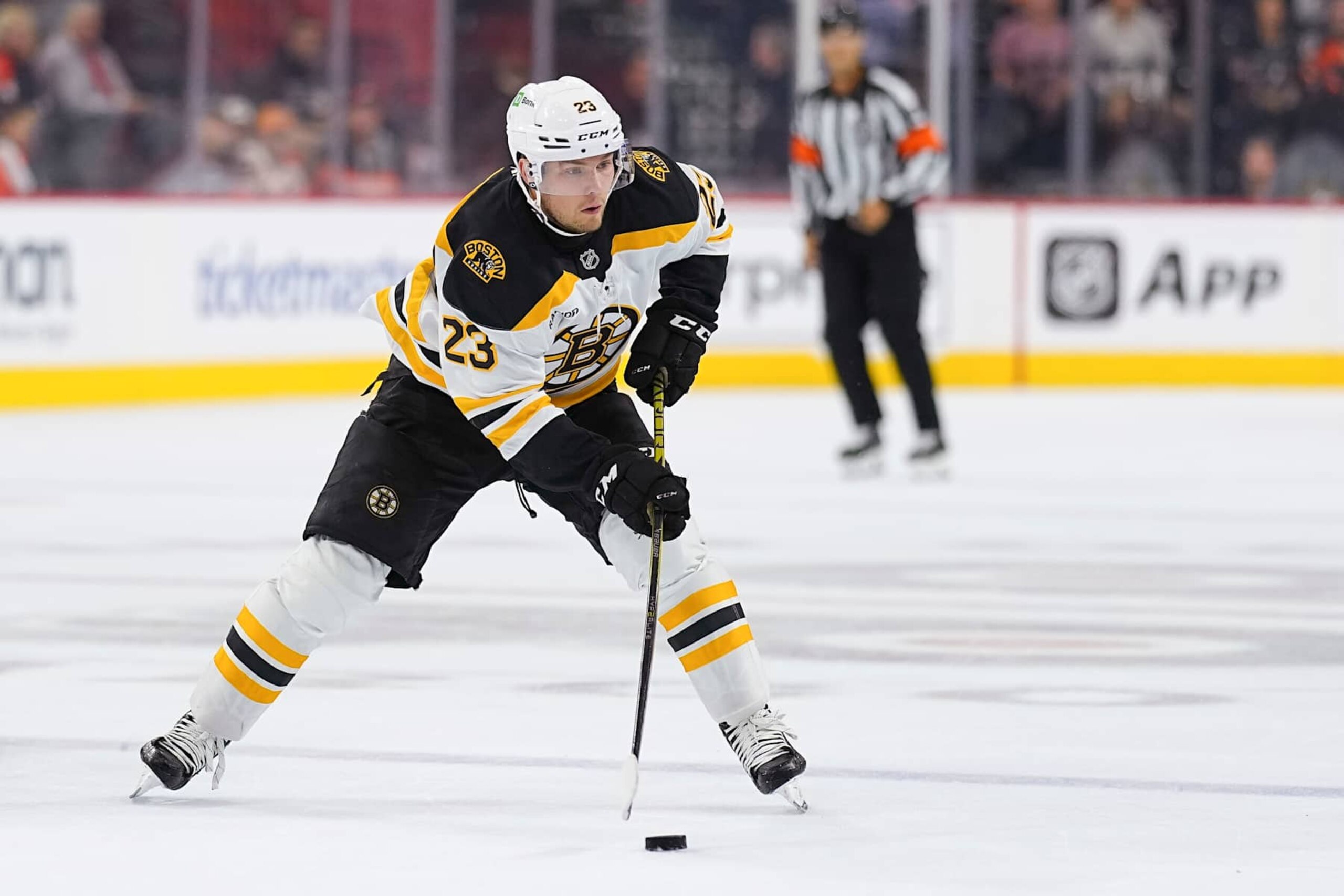 PHILADELPHIA, PENNSYLVANIA - SEPTEMBER 28: Fabian Lysell #23 of the Boston Bruins controls the puck against the Philadelphia Flyers during the preseason game at the Wells Fargo Center on September 28, 2024 in Philadelphia, Pennsylvania. (Photo by Mitchell Leff/Getty Images)