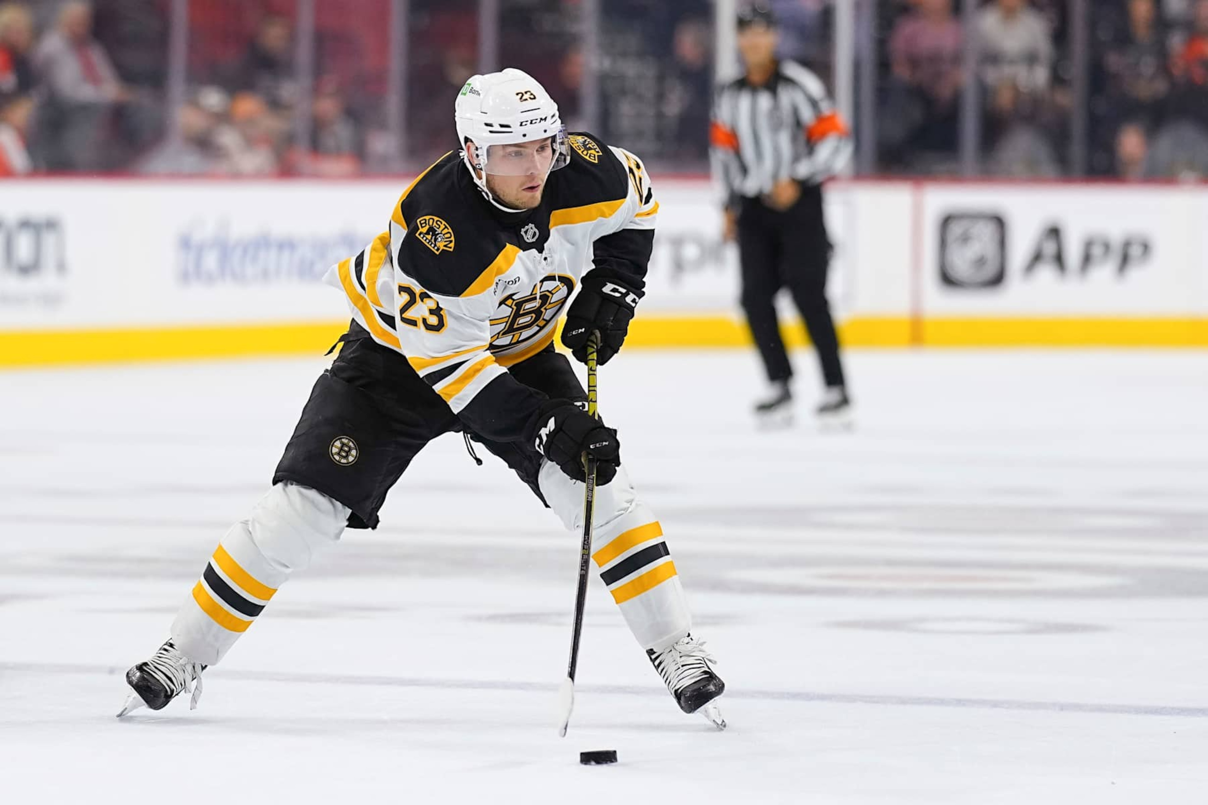PHILADELPHIA, PENNSYLVANIA - SEPTEMBER 28: Fabian Lysell #23 of the Boston Bruins controls the puck against the Philadelphia Flyers during the preseason game at the Wells Fargo Center on September 28, 2024 in Philadelphia, Pennsylvania. (Photo by Mitchell Leff/Getty Images)