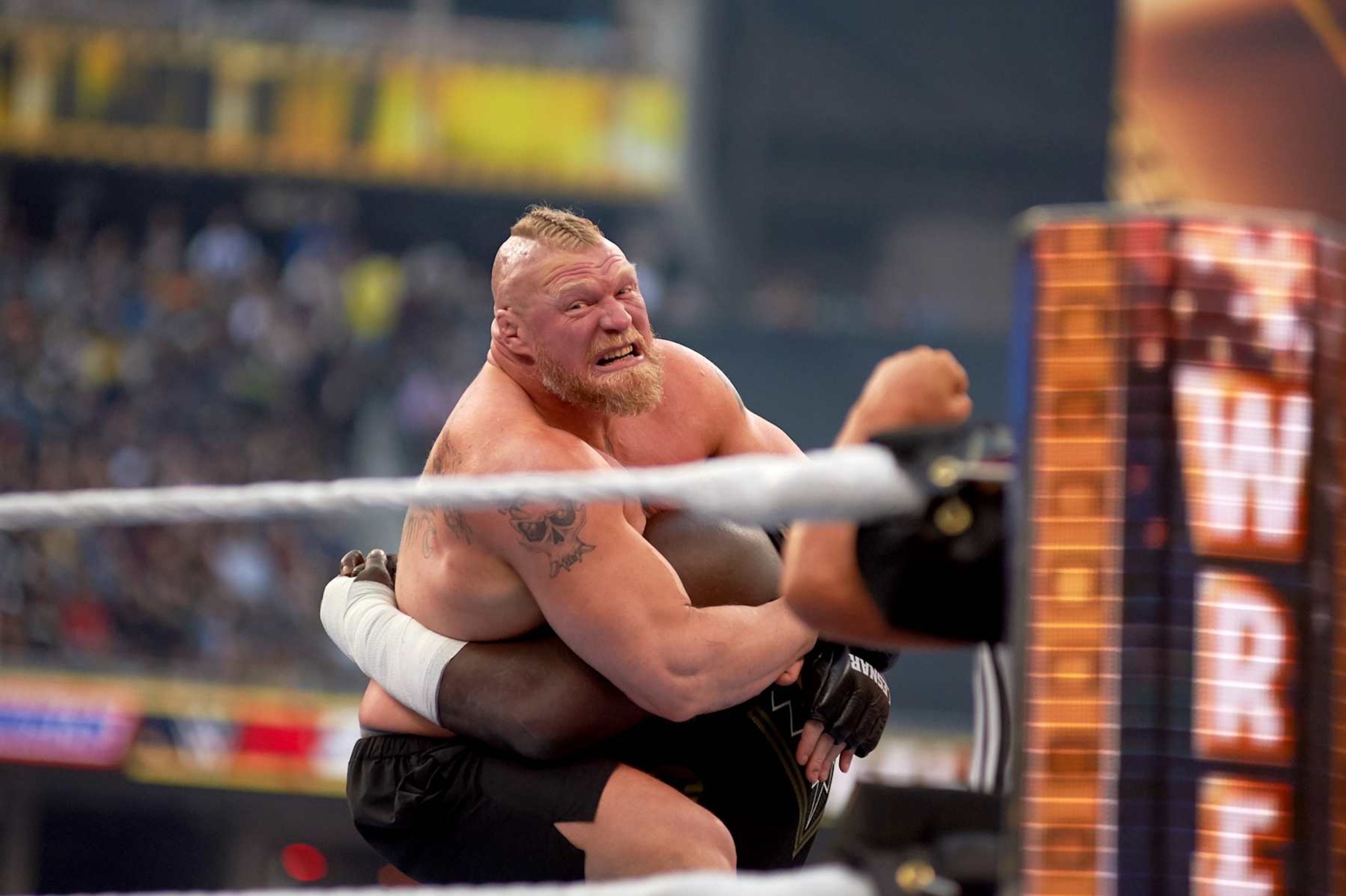 INGLEWOOD, CALIFORNIA - APRIL 02: Brock Lesnar wrestles Omos during WrestleMania 39 at SoFi Stadium on April 02, 2023 in Inglewood, California. (Photo by Unique Nicole/Getty Images)