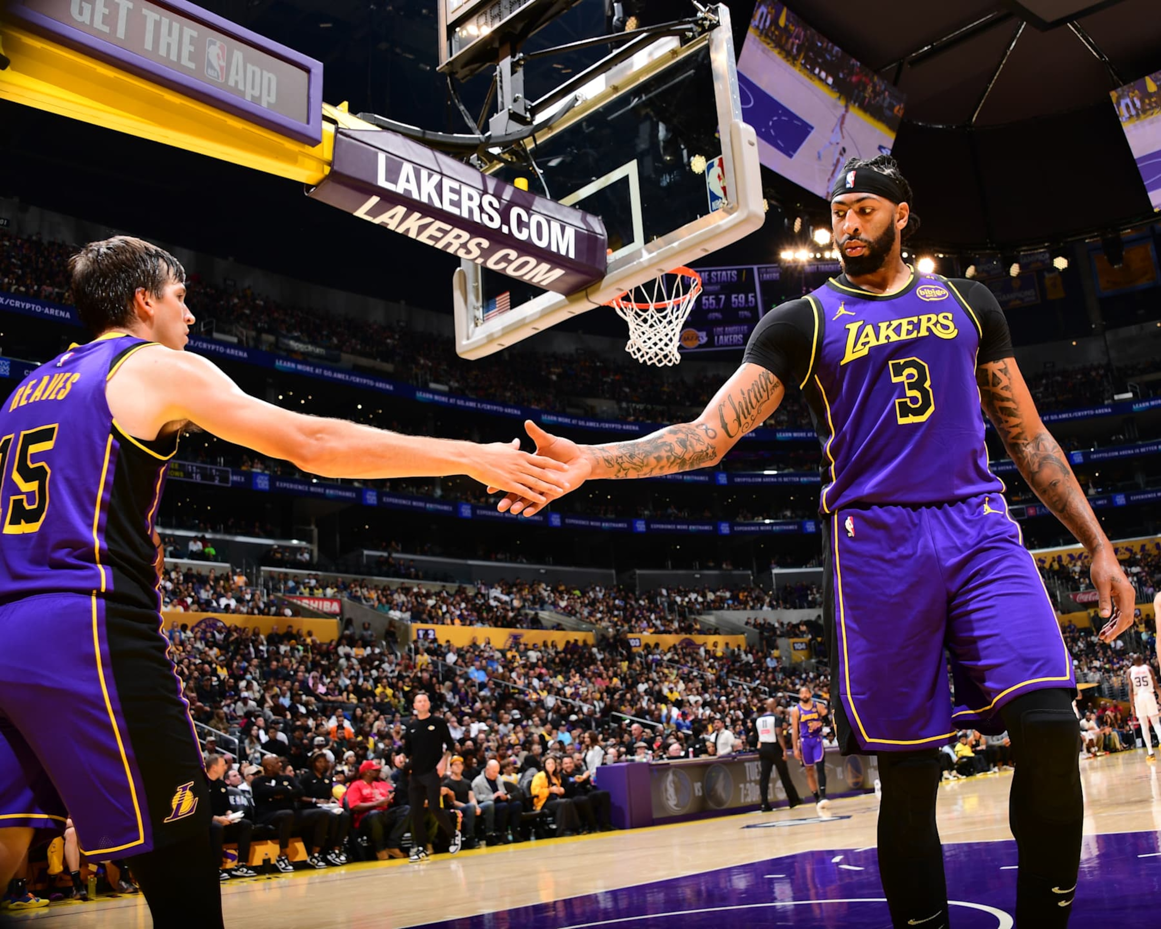 LOS ANGELES, CA - OCTOBER 25: Anthony Davis #3 of the Los Angeles Lakers high fives Austin Reaves #15 of the Los Angeles Lakers during the game against the Phoenix Suns on October 25, 2024 at Crypto.Com Arena in Los Angeles, California. NOTE TO USER: User expressly acknowledges and agrees that, by downloading and/or using this Photograph, user is consenting to the terms and conditions of the Getty Images License Agreement. Mandatory Copyright Notice: Copyright 2024 NBAE (Photo by Adam Pantozzi/NBAE via Getty Images)