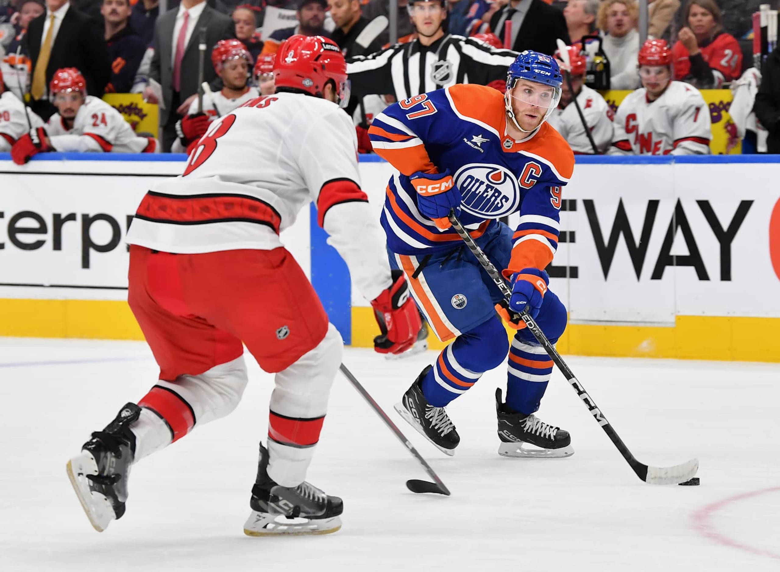 EDMONTON, CANADA - OCTOBER 22: Connor McDavid #97 of the Edmonton Oilers skates against Brent Burns #8 of the Carolina Hurricanes during the game at Rogers Place on October 22, 2024, in Edmonton, Alberta, Canada. (Photo by Andy Devlin/NHLI via Getty Images) EDMONTON, CANADA - OCTOBER 22: Connor McDavid #97 of the Edmonton Oilers skates against Brent Burns #8 of the Carolina Hurricanes during the game at Rogers Place on October 22, 2024, in Edmonton, Alberta, Canada. (Photo by Andy Devlin/NHLI via Getty Images)