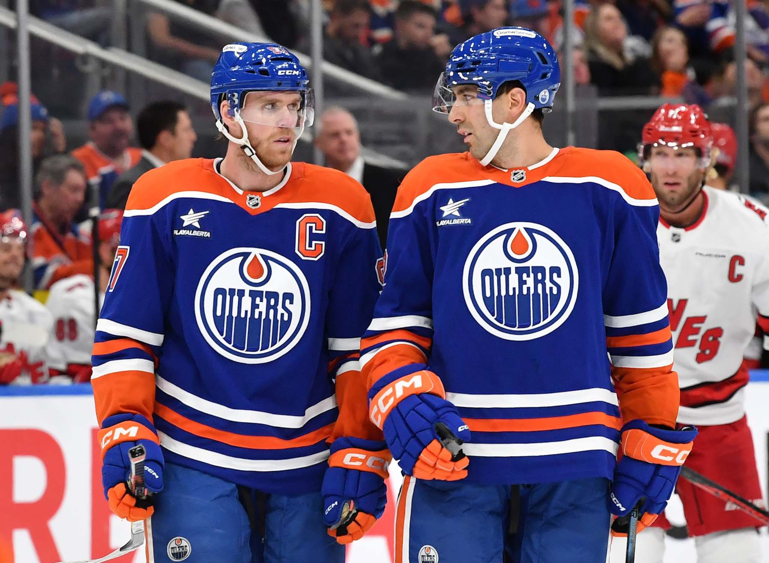 EDMONTON, CANADA - OCTOBER 22: Connor McDavid #97 and Evan Bouchard #2 of the Edmonton Oilers have a conversation during a stoppage in play in the second period of the game at Rogers Place on October 22, 2024, in Edmonton, Alberta, Canada. (Photo by Andy Devlin/NHLI via Getty Images) EDMONTON, CANADA - OCTOBER 22: Connor McDavid #97 and Evan Bouchard #2 of the Edmonton Oilers have a conversation during a stoppage in play in the second period of the game at Rogers Place on October 22, 2024, in Edmonton, Alberta, Canada. (Photo by Andy Devlin/NHLI via Getty Images)