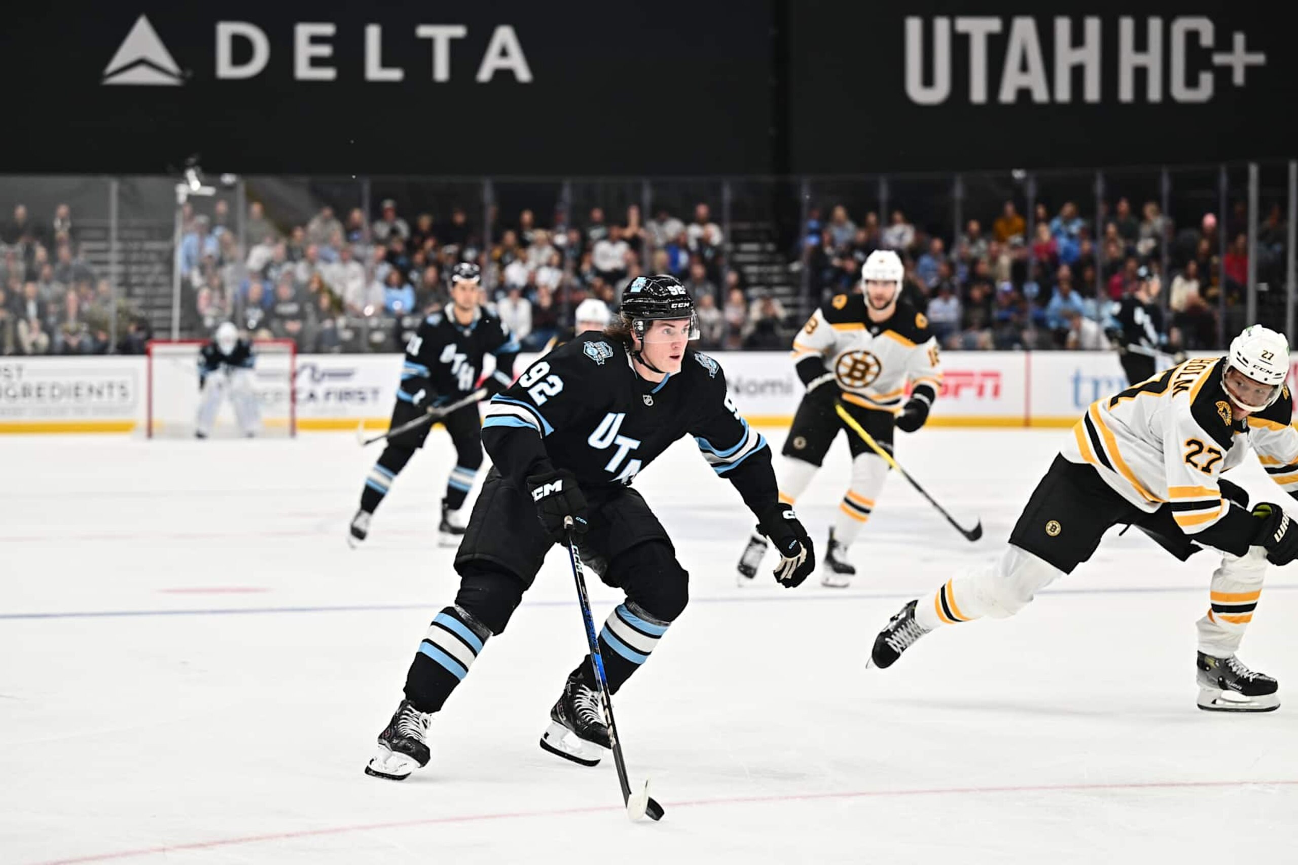 SALT LAKE CITY, UTAH - OCTOBER 19: Logan Cooley #92 of the Utah Hockey Club skates against the Boston Bruins on October 19, 2024 at Delta Center in Salt Lake City, Utah. (Photo by Jamie Sabau/Getty Images) SALT LAKE CITY, UTAH - OCTOBER 19: Logan Cooley #92 of the Utah Hockey Club skates against the Boston Bruins on October 19, 2024 at Delta Center in Salt Lake City, Utah. (Photo by Jamie Sabau/Getty Images)