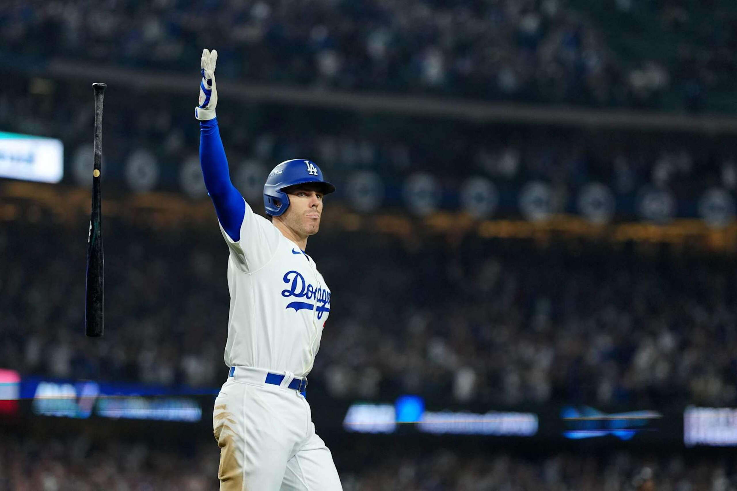 LOS ANGELES, CA - OCTOBER 25: Freddie Freeman #5 of the Los Angeles Dodgers reacts after hitting a walk-off grand slam in the tenth inning during Game 1 of the 2024 World Series presented by Capital One between the New York Yankees and the Los Angeles Dodgers at Dodger Stadium on Friday, October 25, 2024 in Los Angeles, California. (Photo by Daniel Shirey/MLB Photos via Getty Images)