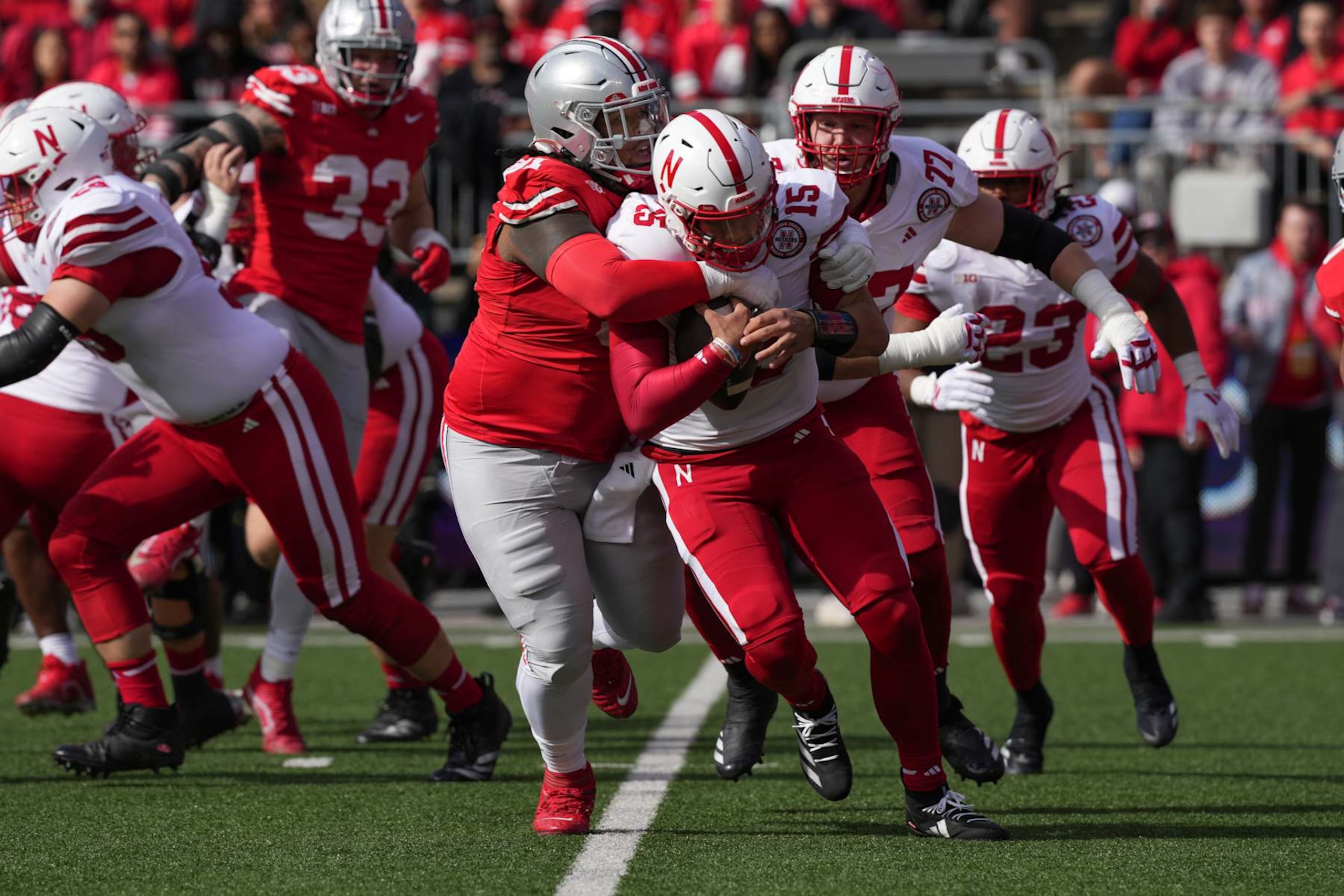 COLUMBUS, OHIO - OCTOBER 26: Defensive tackle Tyleik Williams #91 of the Ohio State Buckeyes sacks quarterback Dylan Raiola #15 of the Nebraska Cornhuskers during the first quarter at Ohio Stadium on October 26, 2024 in Columbus, Ohio. (Photo by Jason Mowry/Getty Images)