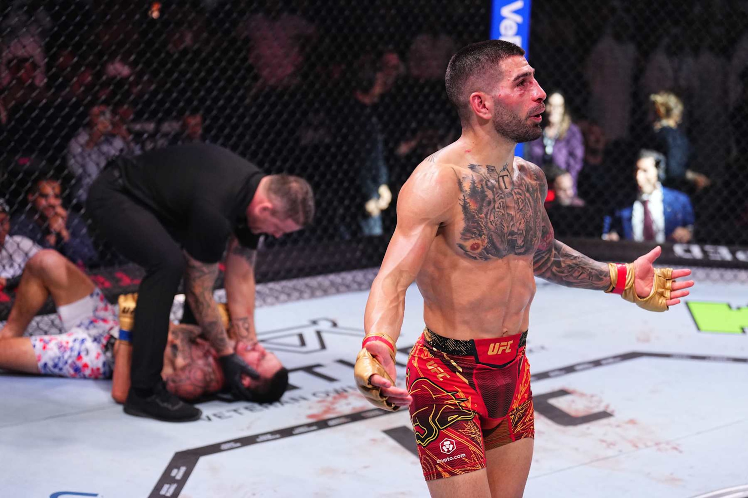 Ilia Topuria of Spain reacts after a knockout victory against Max Holloway