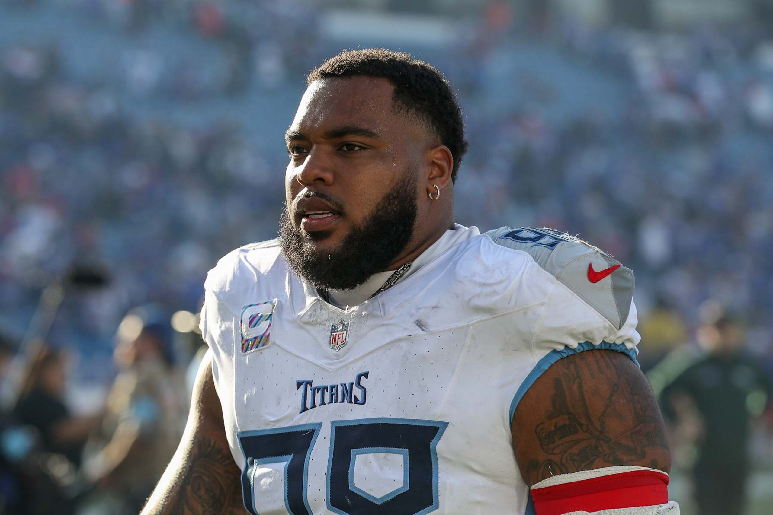 ORCHARD PARK, NEW YORK - OCTOBER 20: Jeffery Simmons #98 of the Tennessee Titans walks off the field after a game against the Buffalo Bills  at Highmark Stadium on October 20, 2024 in Orchard Park, New York. (Photo by Bryan Bennett/Getty Images)