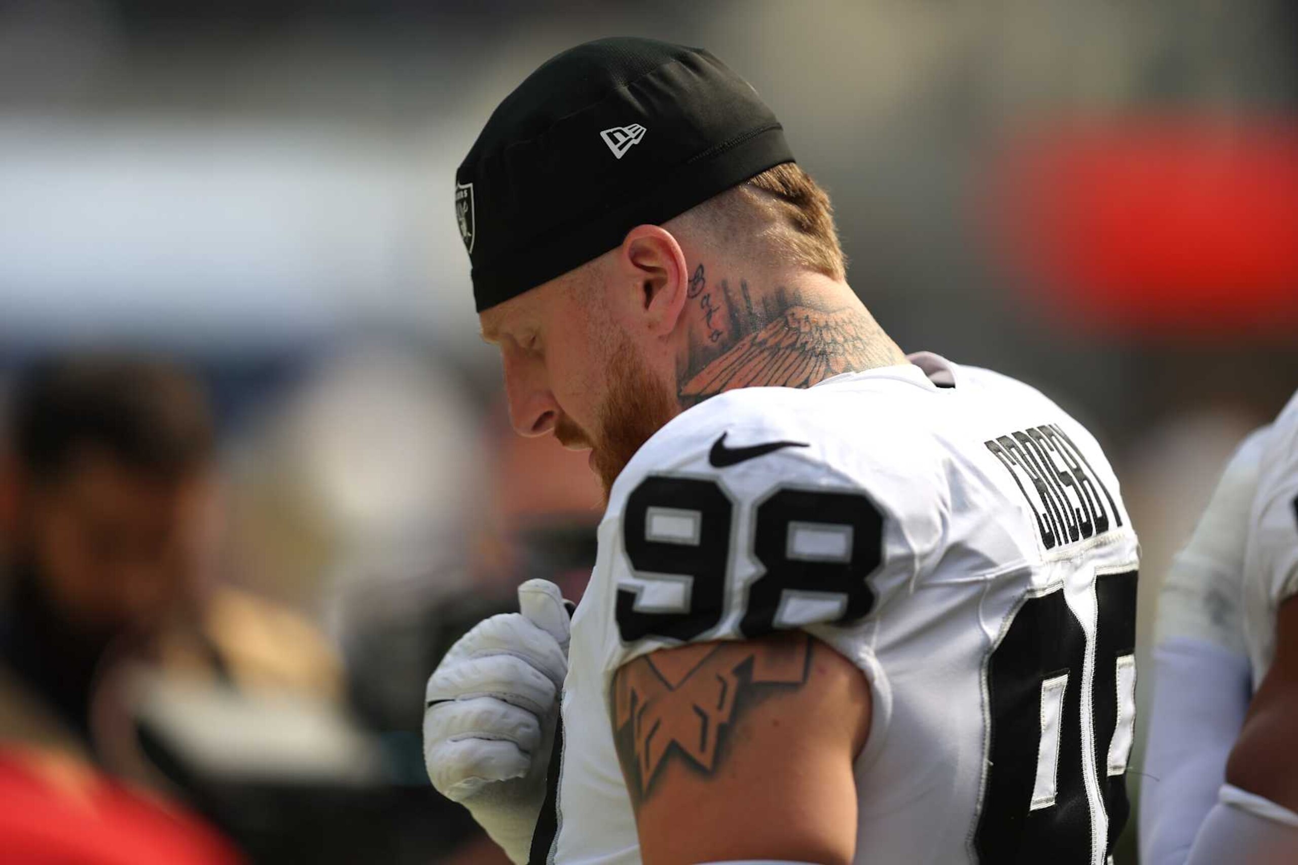 INGLEWOOD, CALIFORNIA - OCTOBER 20: Maxx Crosby #98 of the Las Vegas Raiders stands during the national anthem prior to a game against the Los Angeles Rams at SoFi Stadium on October 20, 2024 in Inglewood, California. (Photo by Joe Scarnici/Getty Images)