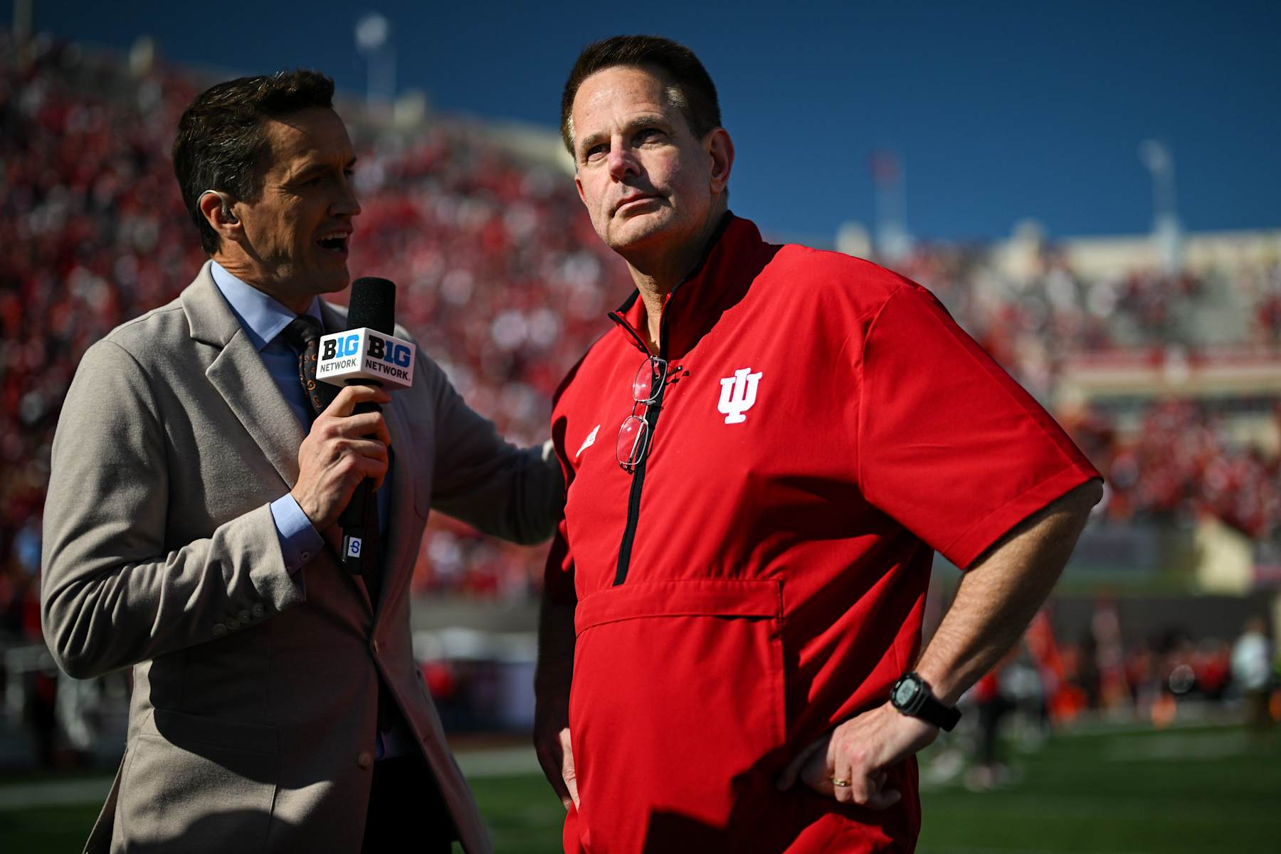 BLOOMINGTON, IN - OCTOBER 26: Indiana Hoosiers head coach Curt Cignetti speaks with Big Ten Network sideline reporter Rhett Lewis following a college football game between the Washington Huskies and Indiana Hoosiers on October 26, 2024 at Memorial Stadium in Bloomington, IN (Photo by James Black/Icon Sportswire via Getty Images)