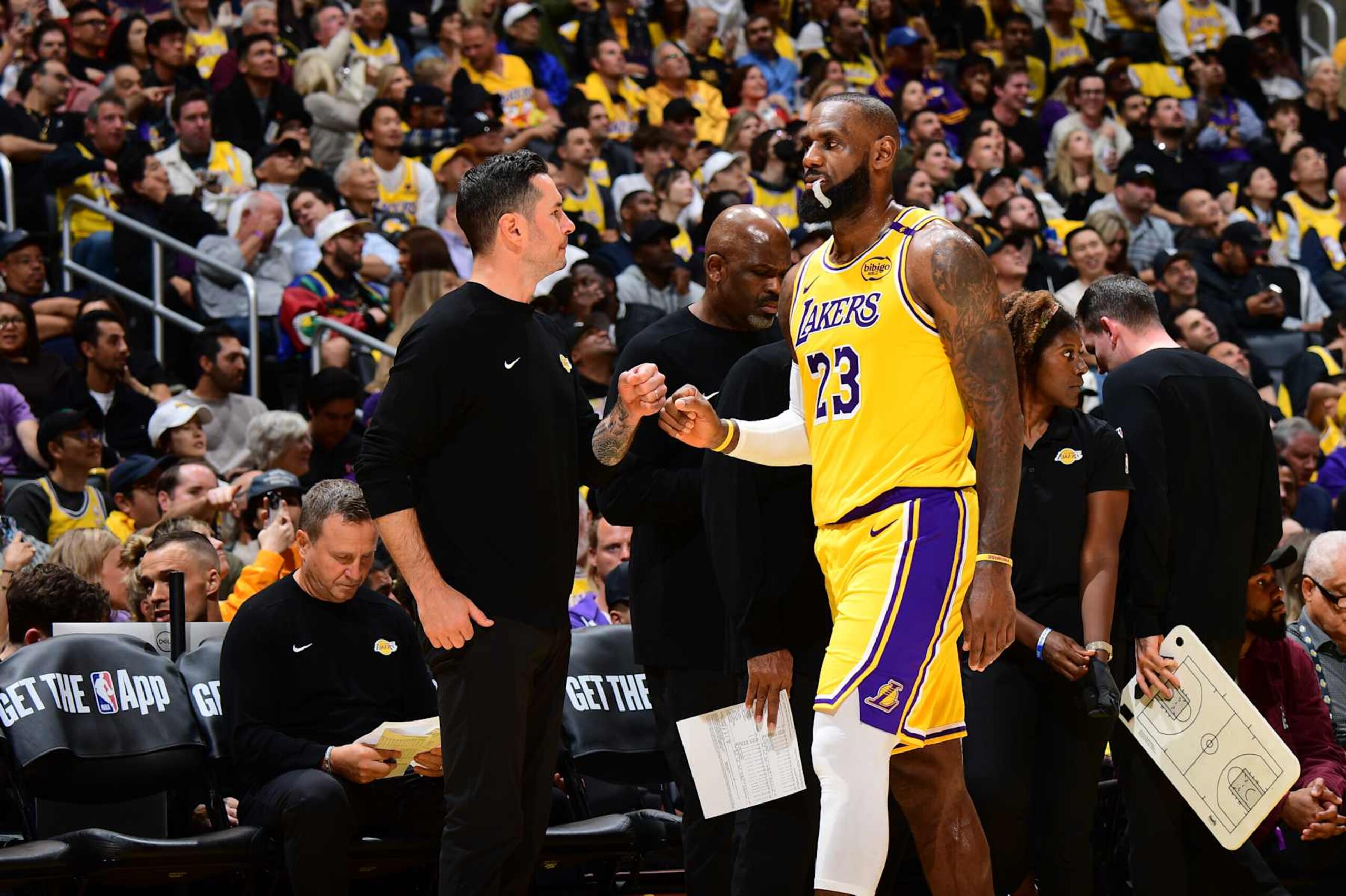 LOS ANGELES, CA - OCTOBER 22: Head Coach JJ Redick of the Los Angeles Lakers fist bumps LeBron James #23 of the Los Angeles Lakers during the game against the Minnesota Timberwolves on October 22, 2024 at Crypto.Com Arena in Los Angeles, California. NOTE TO USER: User expressly acknowledges and agrees that, by downloading and/or using this Photograph, user is consenting to the terms and conditions of the Getty Images License Agreement. Mandatory Copyright Notice: Copyright 2024 NBAE (Photo by Adam Pantozzi/NBAE via Getty Images) LOS ANGELES, CA - OCTOBER 22: Head Coach JJ Redick of the Los Angeles Lakers fist bumps LeBron James #23 of the Los Angeles Lakers during the game against the Minnesota Timberwolves on October 22, 2024 at Crypto.Com Arena in Los Angeles, California. NOTE TO USER: User expressly acknowledges and agrees that, by downloading and/or using this Photograph, user is consenting to the terms and conditions of the Getty Images License Agreement. Mandatory Copyright Notice: Copyright 2024 NBAE (Photo by Adam Pantozzi/NBAE via Getty Images)