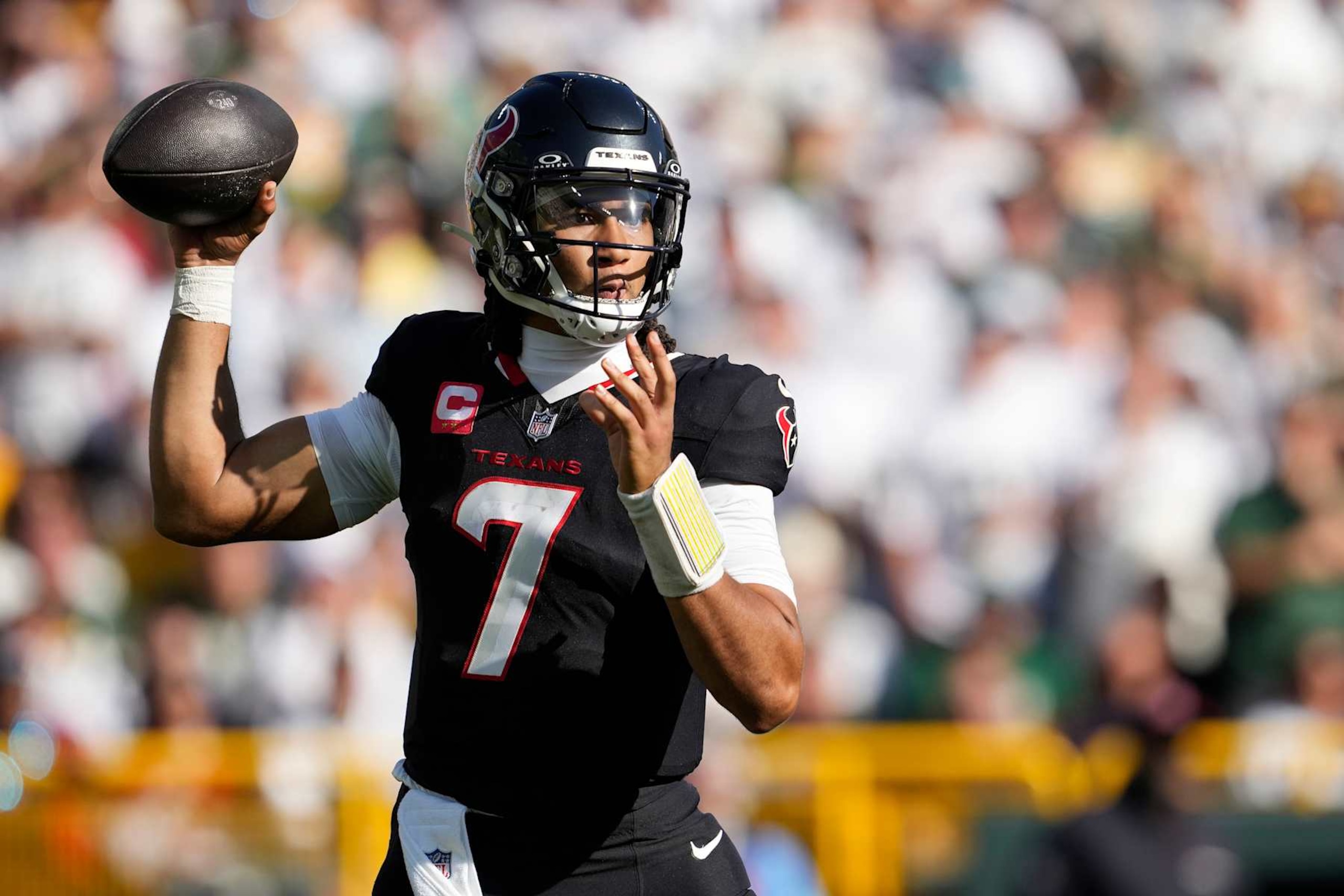 GREEN BAY, WISCONSIN - OCTOBER 20: C.J. Stroud #7 of the Houston Texans looks to throw a pass against the Green Bay Packers in the second half during a game at Lambeau Field on October 20, 2024 in Green Bay, Wisconsin. (Photo by Patrick McDermott/Getty Images) GREEN BAY, WISCONSIN - OCTOBER 20: C.J. Stroud #7 of the Houston Texans looks to throw a pass against the Green Bay Packers in the second half during a game at Lambeau Field on October 20, 2024 in Green Bay, Wisconsin. (Photo by Patrick McDermott/Getty Images)
