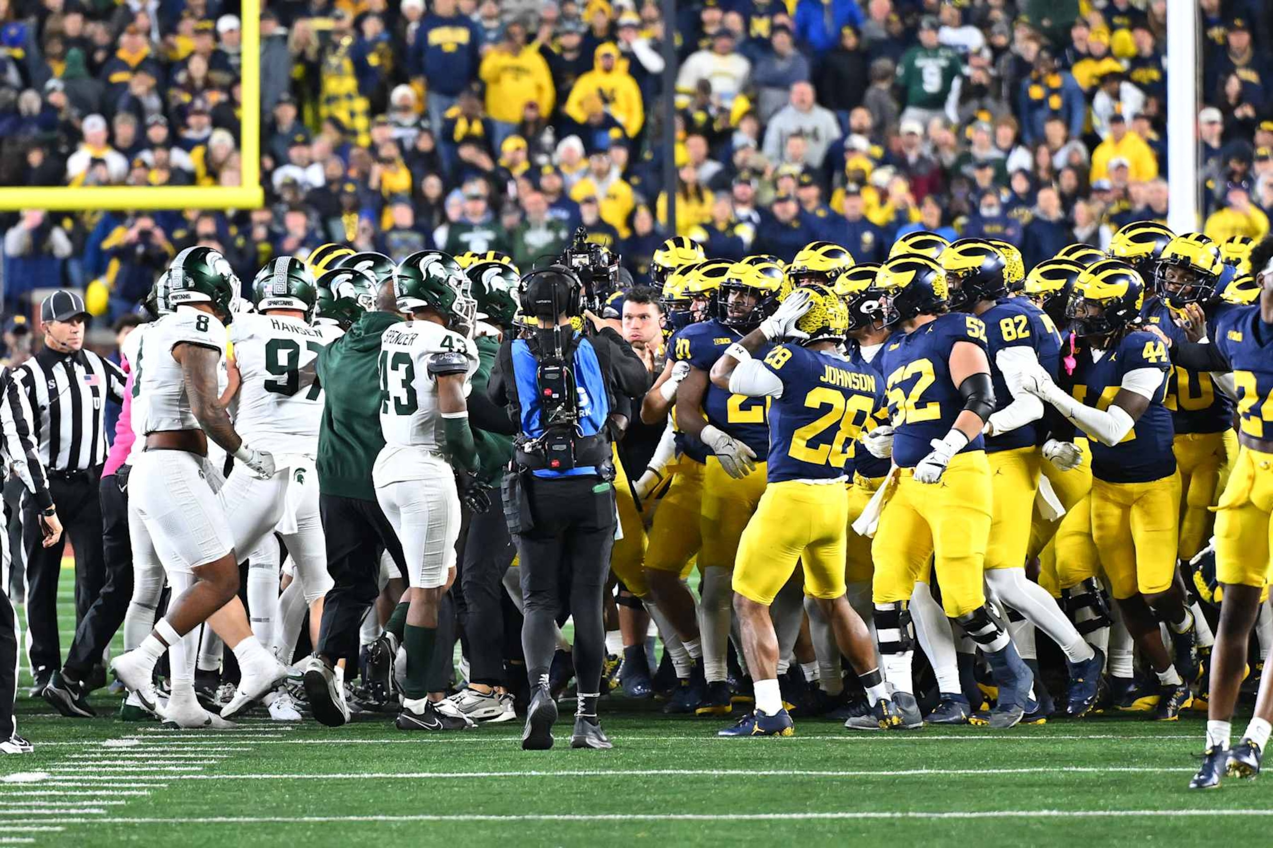 ANN ARBOR, MI - OCTOBER 26: The Michigan Wolverines and Michigan State Spartans come together in a fight at the end of the game during the Michigan Wolverines versus the Michigan State Spartans game on Saturday October 26, 2024 at Michigan Stadium in Ann Arbor, MI. (Photo by Steven King/Icon Sportswire via Getty Images)