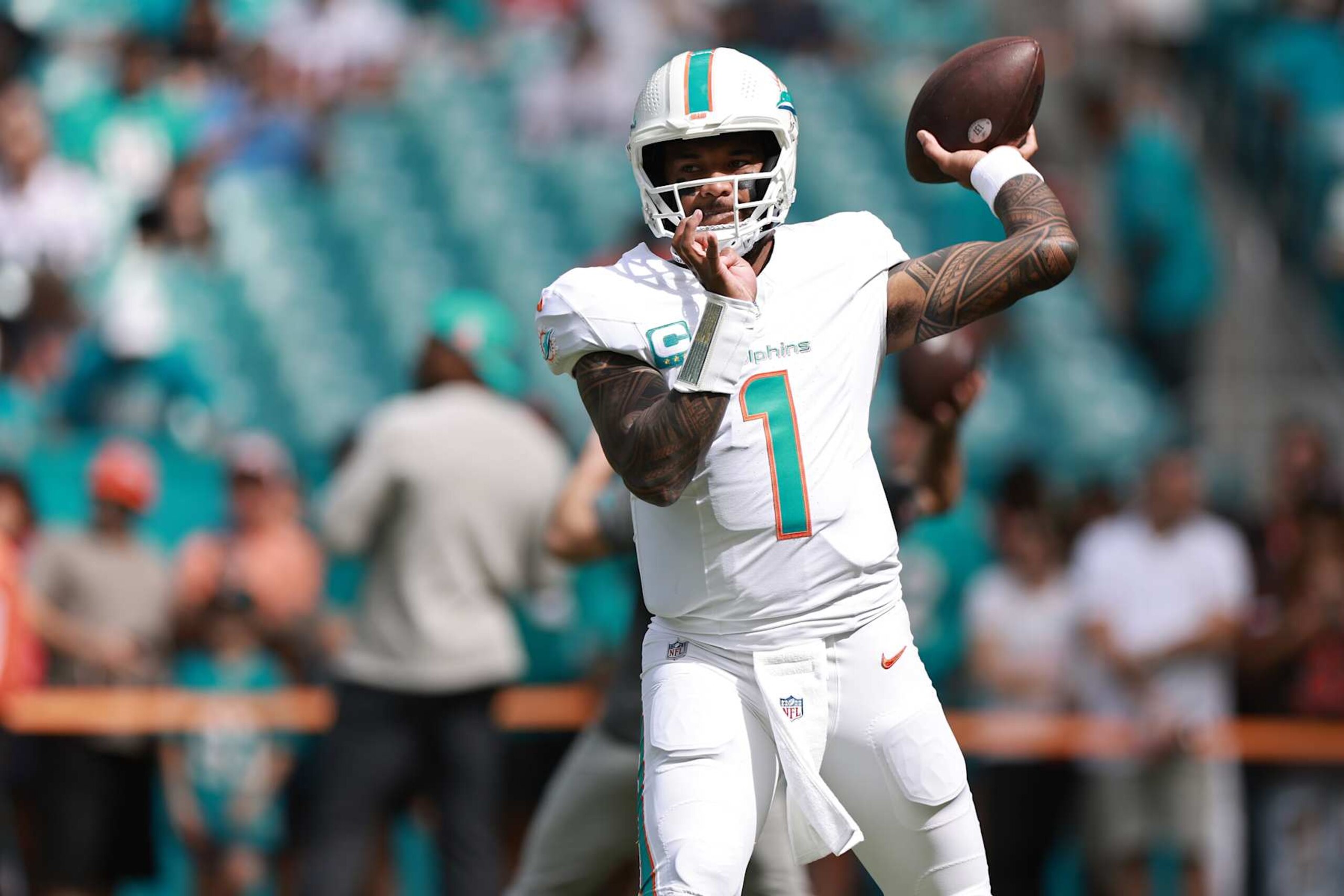 MIAMI GARDENS, FLORIDA - OCTOBER 27: Tua Tagovailoa #1 of the Miami Dolphins warms up prior to a game against the Arizona Cardinals at Hard Rock Stadium on October 27, 2024 in Miami Gardens, Florida. (Photo by Carmen Mandato/Getty Images)