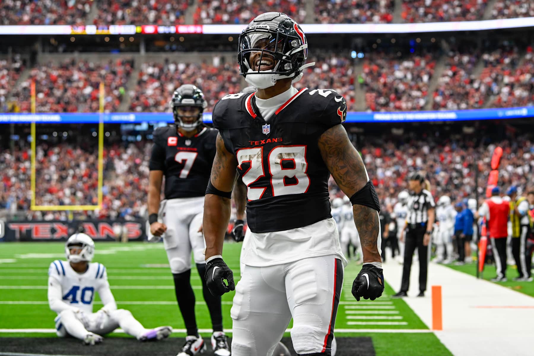 HOUSTON, TX - OCTOBER 27: Houston Texans running back Joe Mixon (28) celebrates his first half rushing touchdown during the football game between the Indianapolis Colts and Houston Texans on October 27, 2024 at NRG Stadium in Houston, Texas. (Photo by Ken Murray/Icon Sportswire via Getty Images)