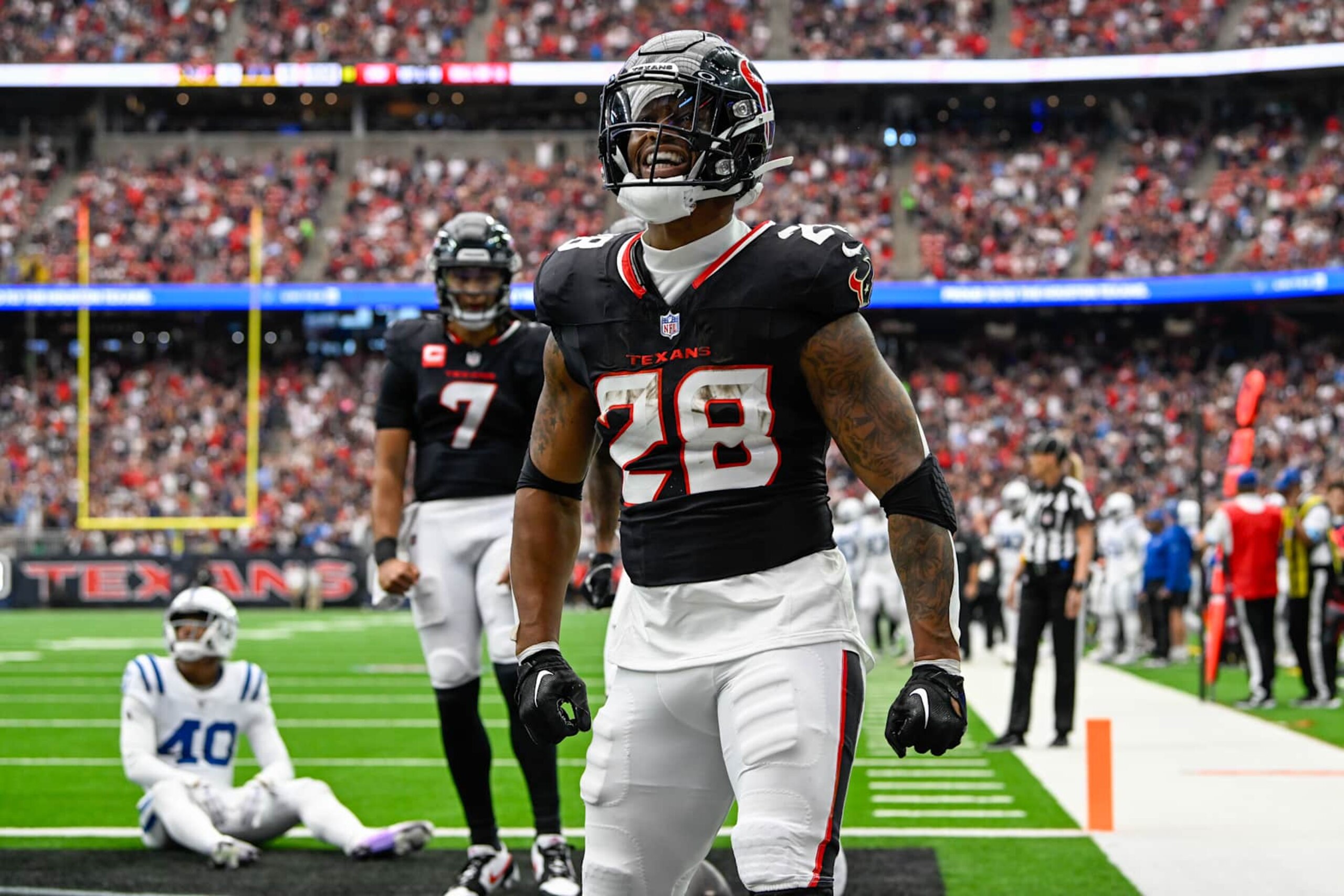 HOUSTON, TX - OCTOBER 27: Houston Texans running back Joe Mixon (28) celebrates his first half rushing touchdown during the football game between the Indianapolis Colts and Houston Texans on October 27, 2024 at NRG Stadium in Houston, Texas. (Photo by Ken Murray/Icon Sportswire via Getty Images)