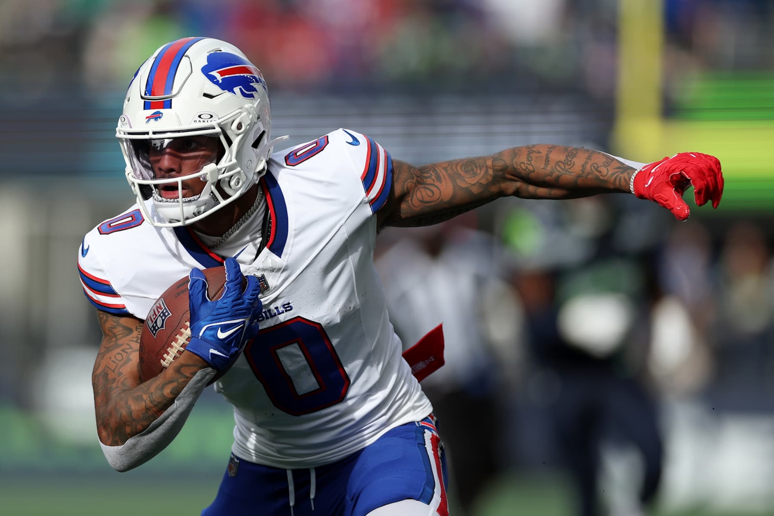SEATTLE, WASHINGTON - OCTOBER 27: Keon Coleman #0 of the Buffalo Bills runs with the ball during the first quarter against the Seattle Seahawks at Lumen Field on October 27, 2024 in Seattle, Washington. (Photo by Steph Chambers/Getty Images)