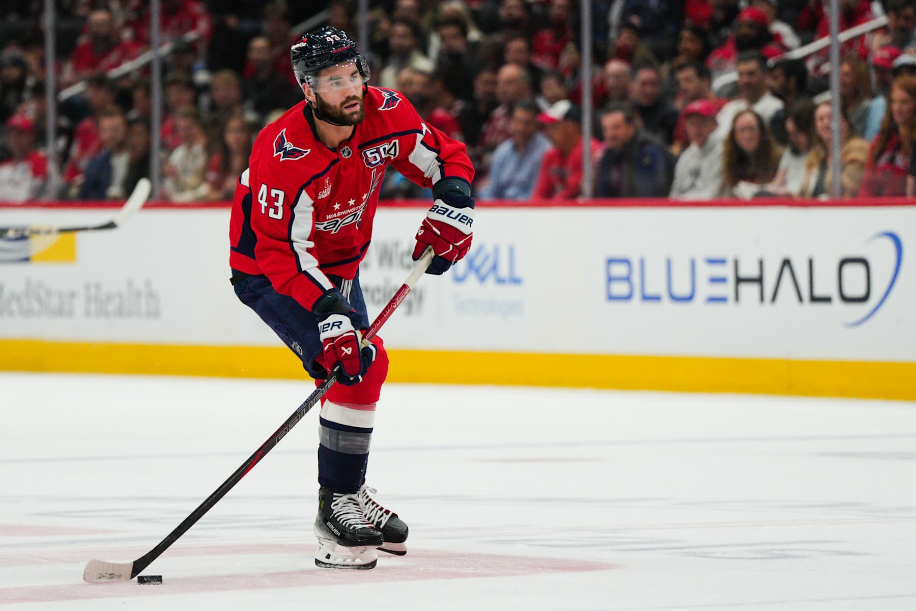 WASHINGTON, DC - OCTOBER 23: Tom Wilson #43 of the Washington Capitals skates with the puck during the first period of a game against the Philadelphia Flyers at Capital One Arena on October 23, 2024 in Washington, D.C. (Photo by Jess Rapfogel/NHLI via Getty Images)
